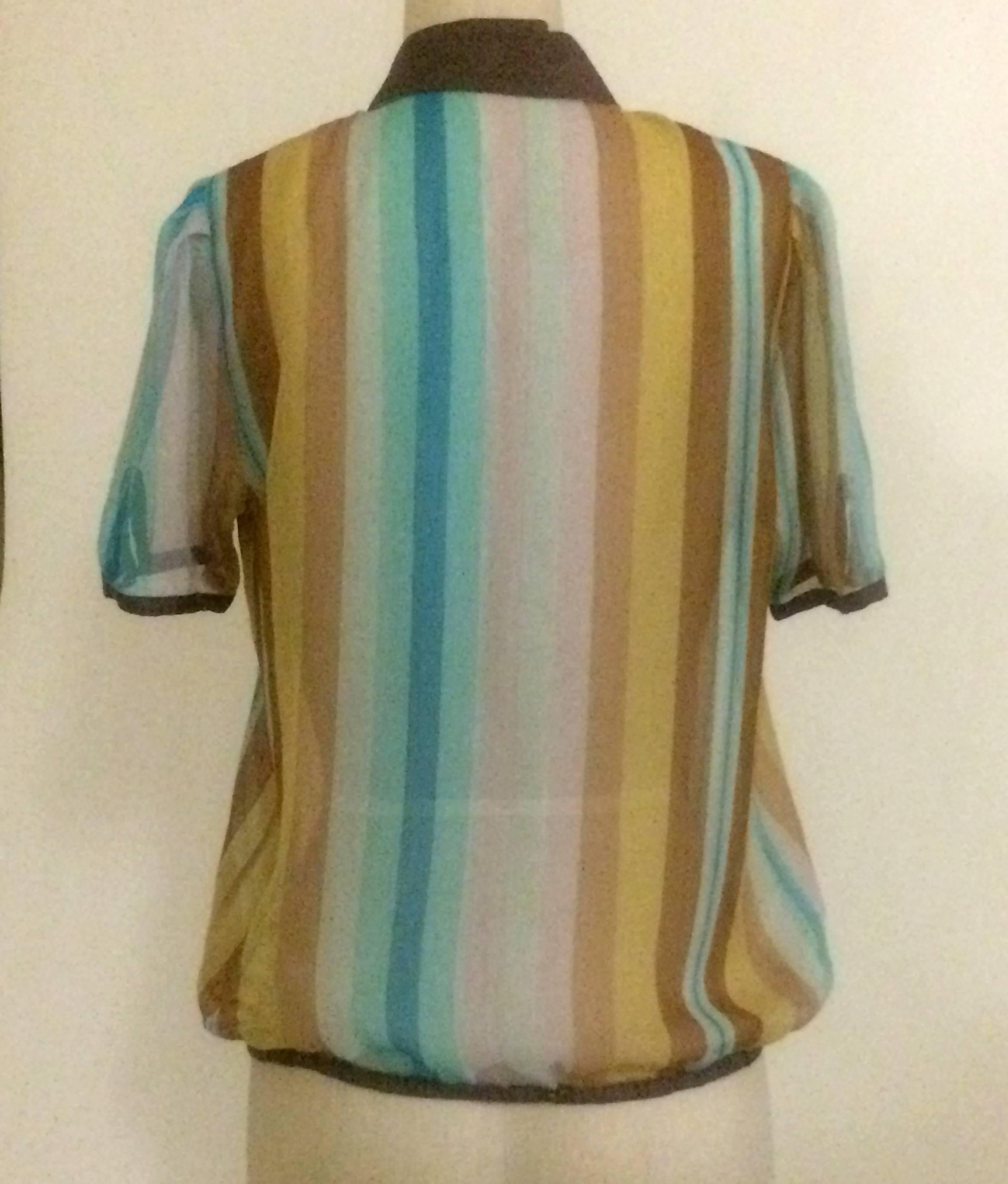 Christian Dior vintage semi-sheer multi color striped blouse with brown trim. Extra long keyhole at front, or can be worn with collar unbuttoned for a more laid back look. Cute with jeans, or makes a lovely beach cover over a chocolate brown