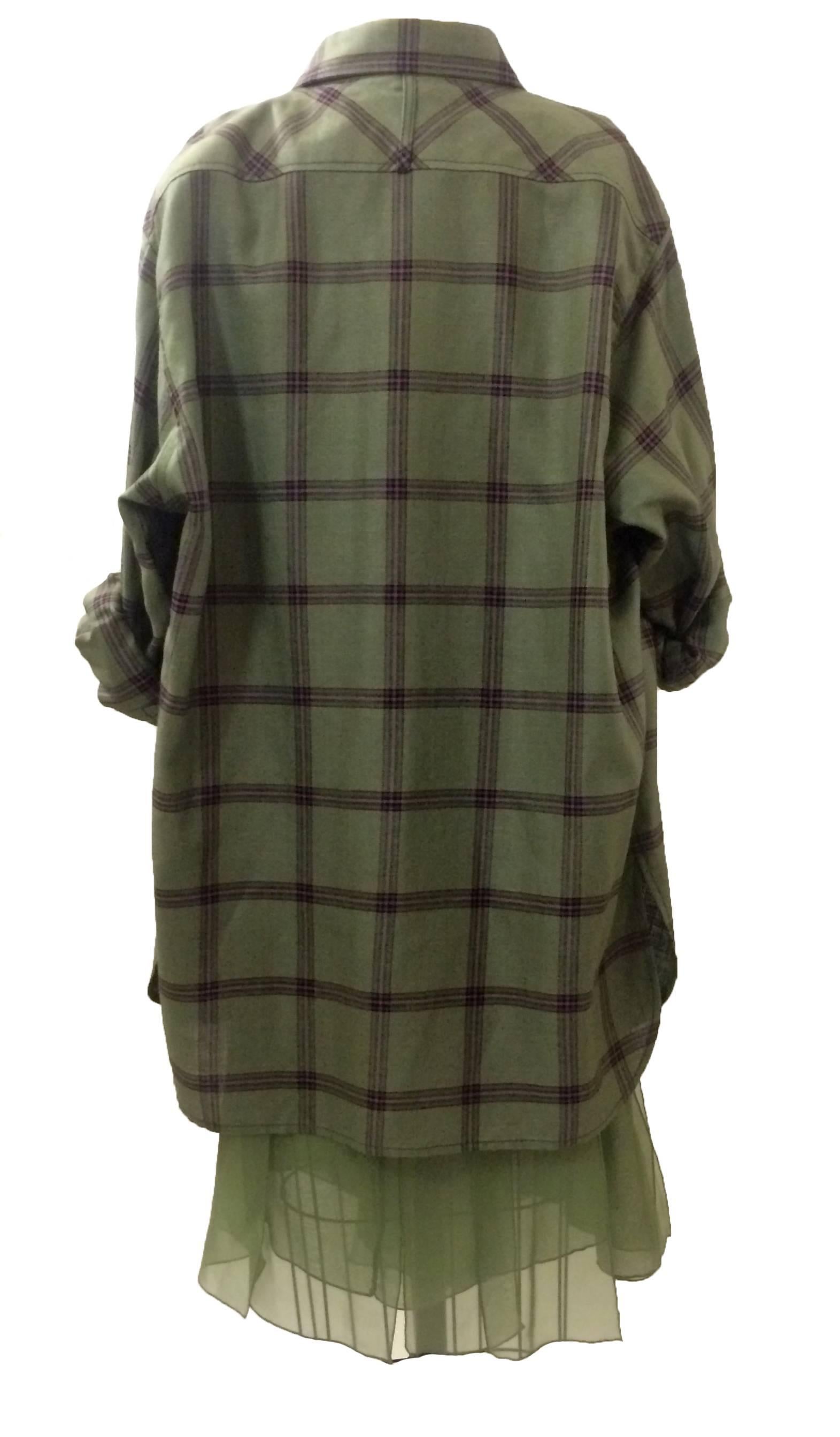 Vintage 1990s Galanos three piece set in sage green, with a plaid jacket and silk chiffon skirt and cape-style top with slit sides. 

Top is comprised of three layers of silk chiffon with open sides. (Semi-sheer.)
Skirt is made of silk chiffon