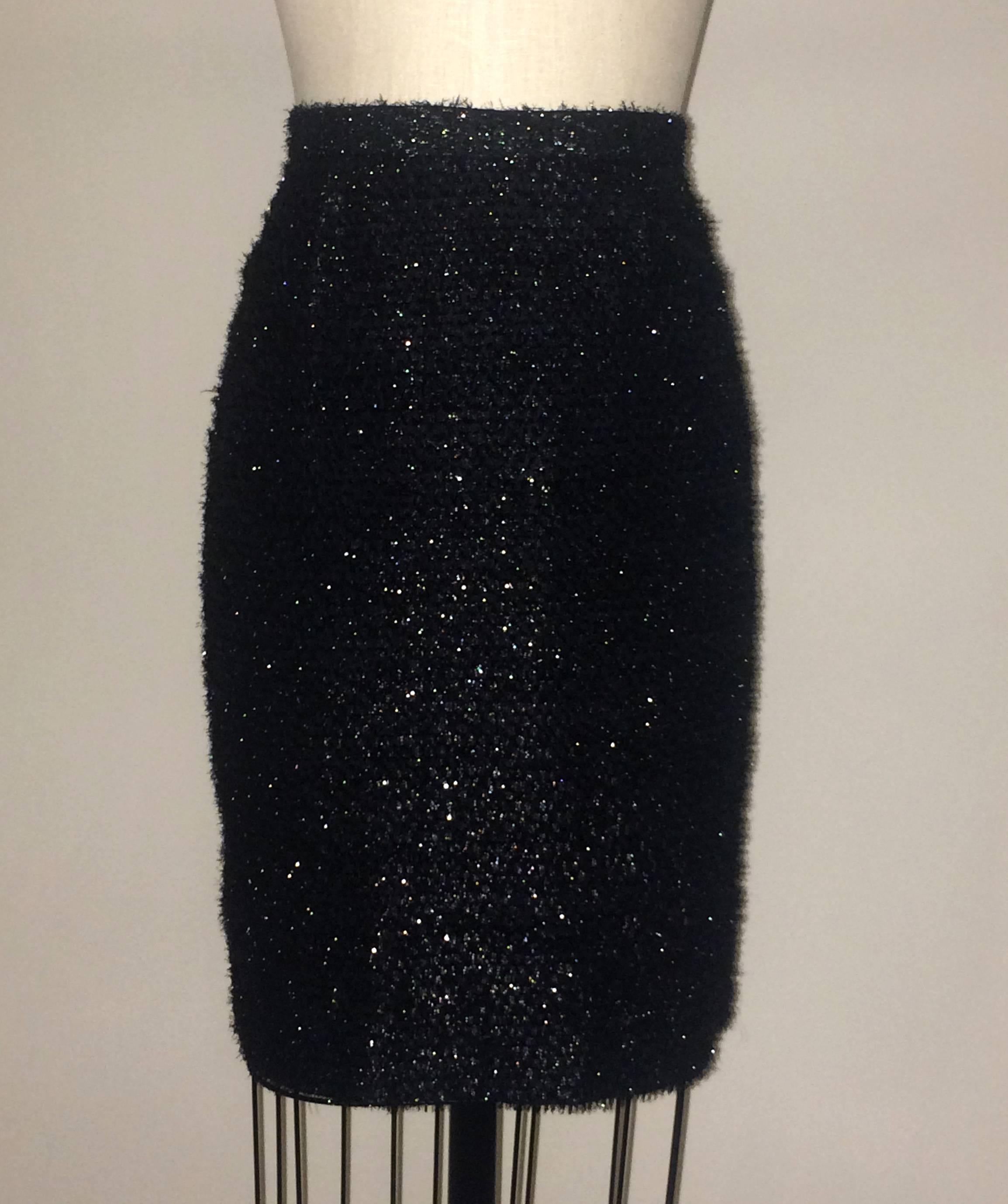 Stephen Sprouse 'Sprouse' vintage 1980s black pencil skirt with metallic eyelash fringe throughout. Back zip, hook, and button.

80% rayon, 20% polyester. Fully lined in 100% acetate.

Made in Korea. 

Size 8. Runs small, see measurements.
Waist
