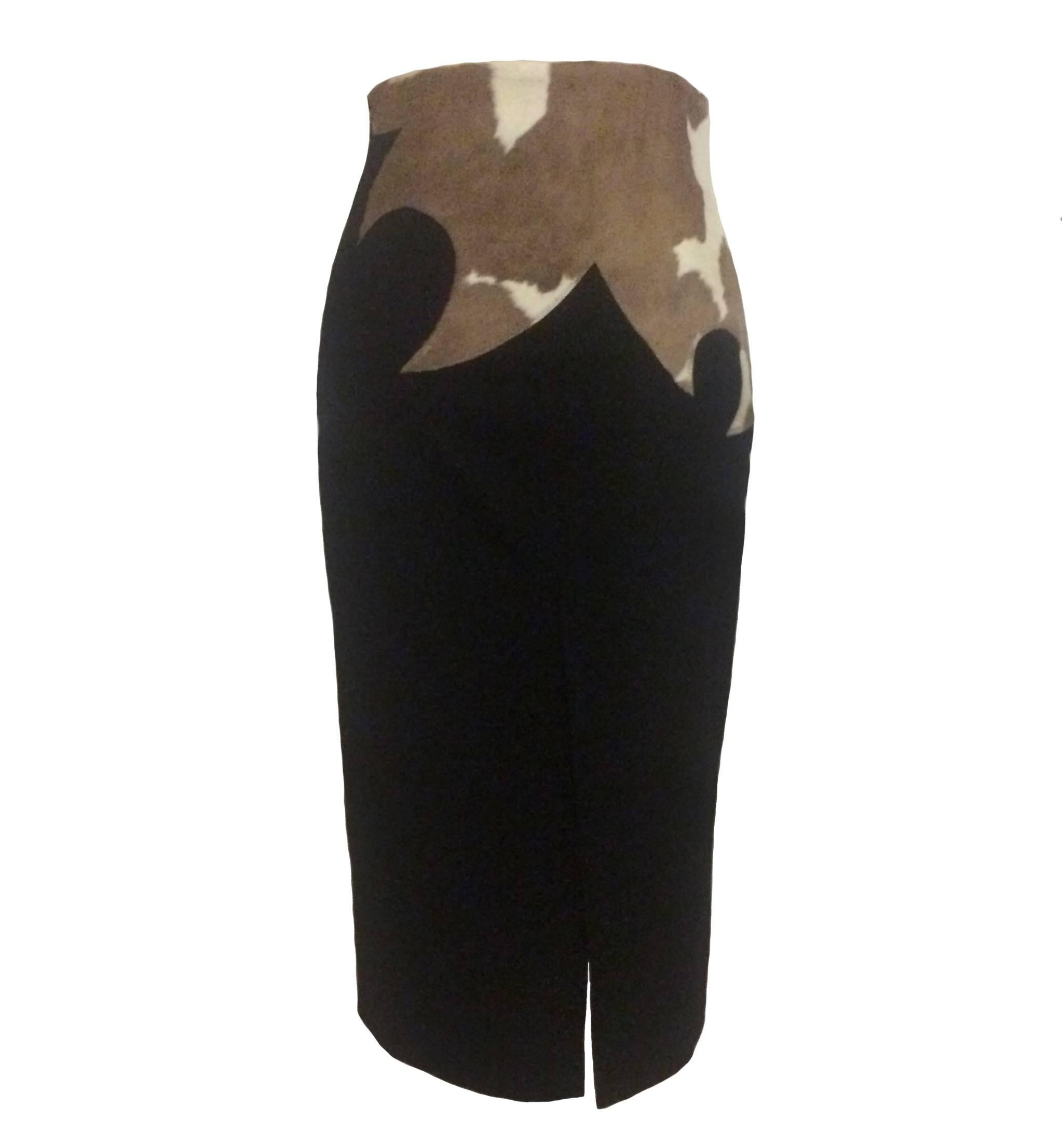 Alexander McQueen black pencil skirt with pony detailing at top. Side zip and hook and eye.

73% wool, 20% polyamide, 7% cashmere.
Leather trim. 
Fully lined.

Made in Italy.

Size IT 44, approximate US 8. Runs small, see