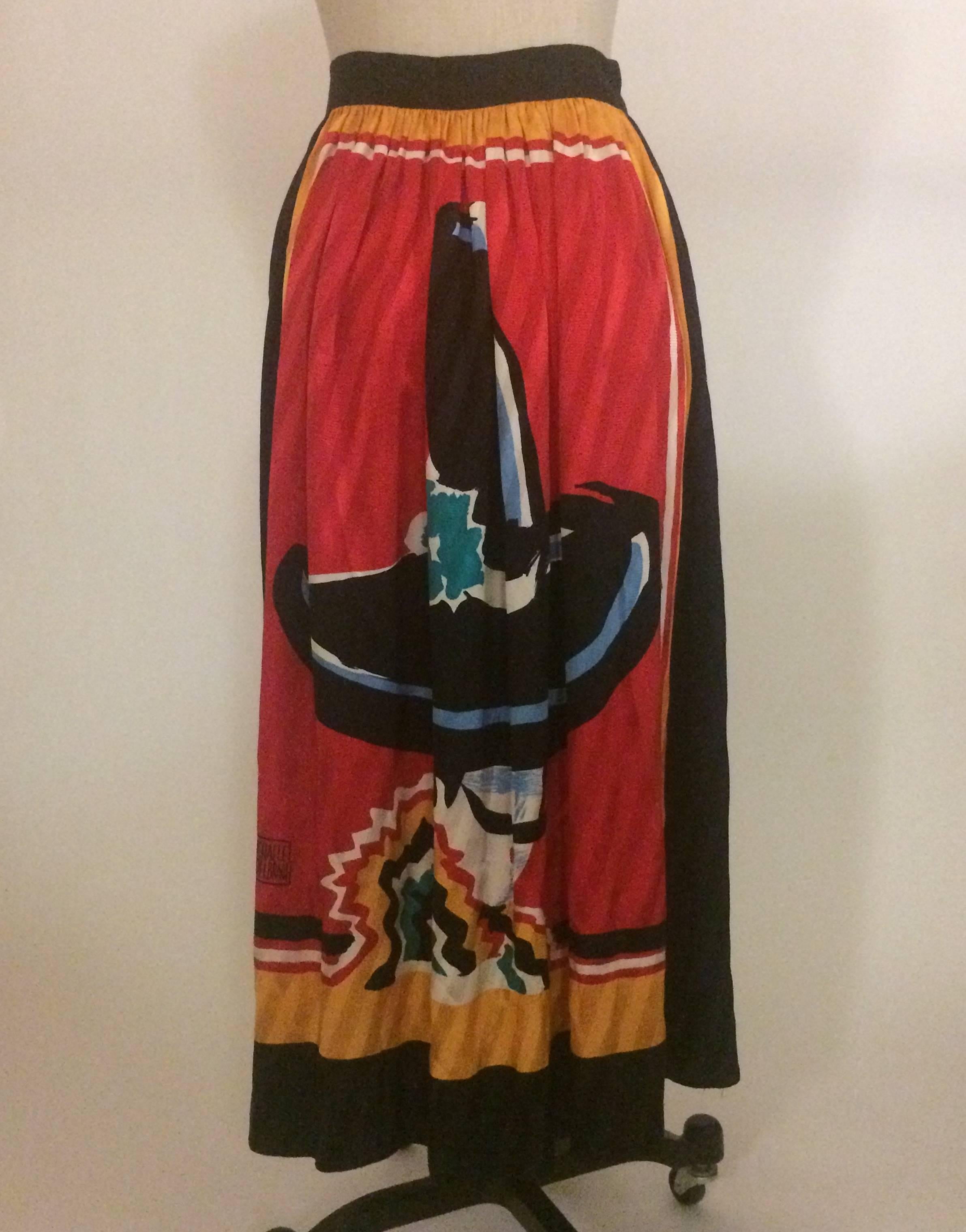 Michaele Vollbracht 1980s silk maxi skirt in yellow featuring image of a man in a sombrero hat on front and back. Fastens at side with a hook and eye at waist.

100% silk.

Made in Korea.

Size 10. Runs small, see measurements.
Waist 30