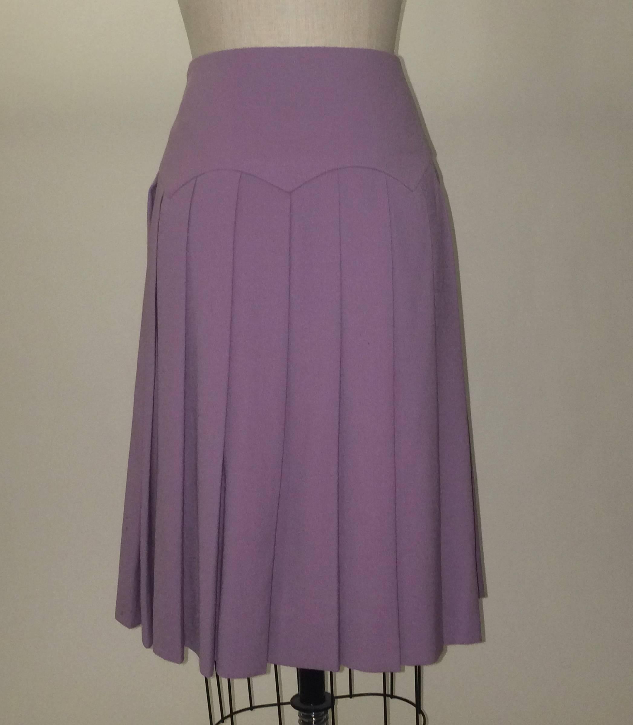 Givenchy Paris 1990s skirt by Alexander McQueen with pleats cascading down from scalloped waistband. Side zip and hook and eye.

100% wool crepe.

Made in France. 

Size FR 40, approximate US 8. See measurements, may run small.
Waist 29