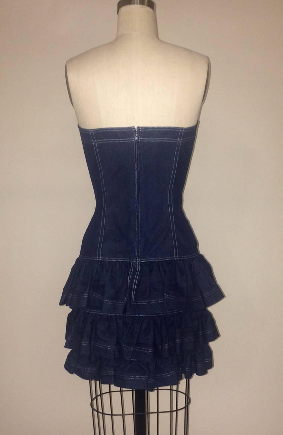Patrick Kelly 1980s dark blue denim strapless dress with sweetheart neckline and tiered ruffle skirt. Back zip.

100% cotton.

Made in France.

Size US 6, fits more like modern 4, see measurements.
Bust 30