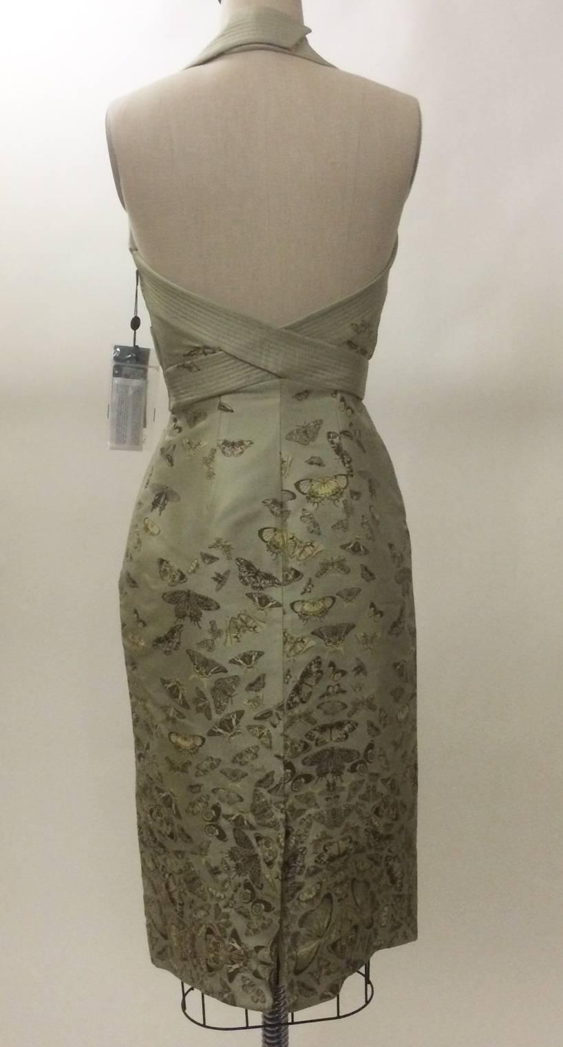 Alexander McQueen 2006 light sage green dress with butterfly (or moth?) print throughout. Halter top and low cut back. Side zip, snap and hook closures at strap.

100% silk.
Fully lined in 100% silk.

Made in Italy.

Size IT 38, usually US 2.