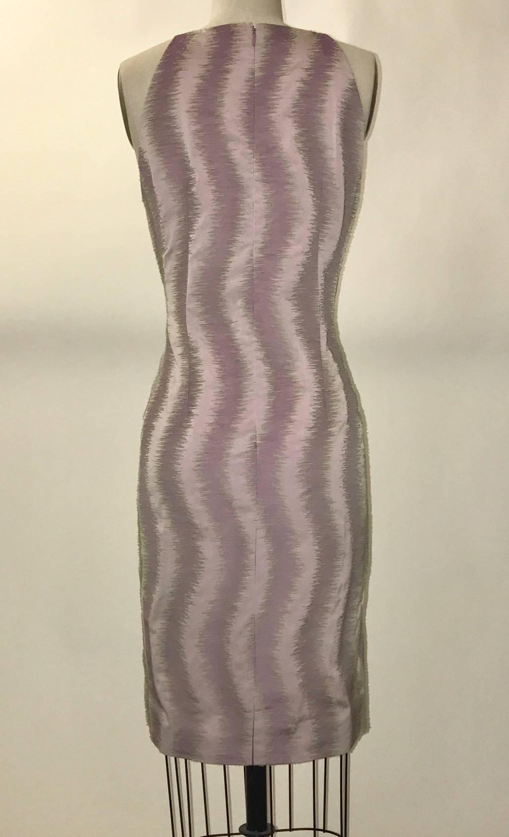 Gianni Versace Couture vintage 1990s sleeveless shift dress in a lavender wave pattern with nubby sea green accents. (Amazing textile, check out close up!) Back zip and hook and eye.

Content unknown, no fabric label.

Made in Italy.

Size IT