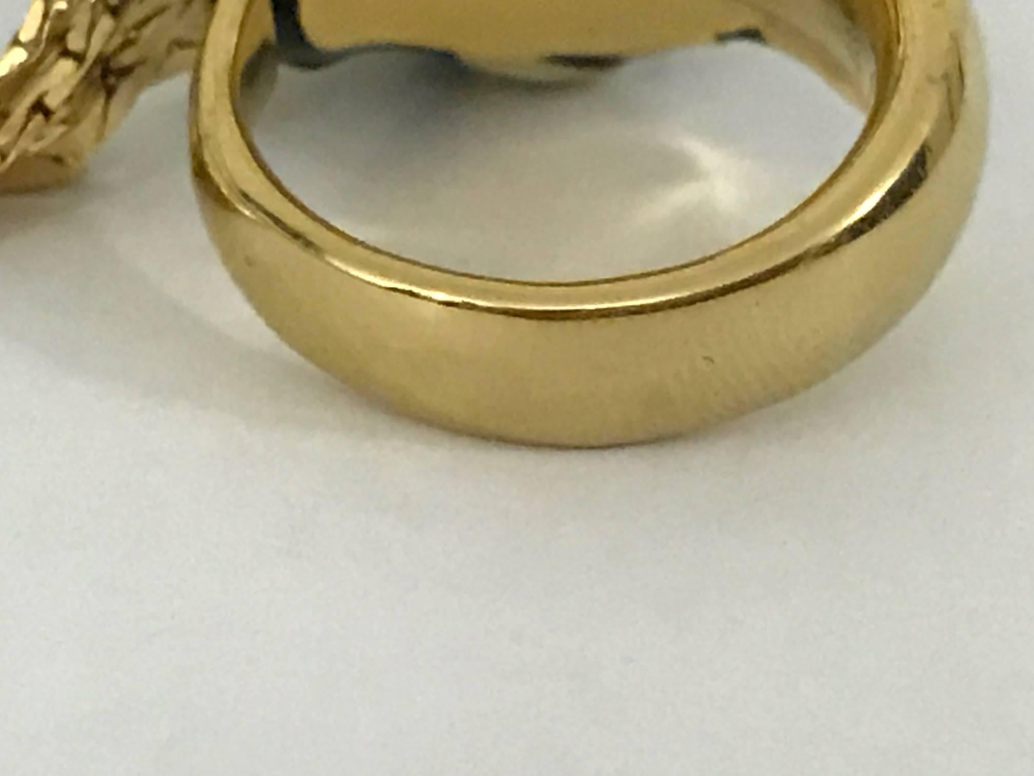 gucci black and gold ring