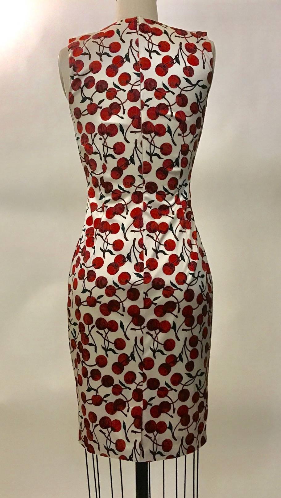 Dolce & Gabbana 1990s fitted cherry print dress in their iconic cherry print. Scoop neck at front, sleeveless. Back zip and hook and eye.

60% silk, 32% nylon, 8% elastane.
Fully lined in 64% viscose, 32% nylon, 4% elastane.

Made in Italy.

Size IT