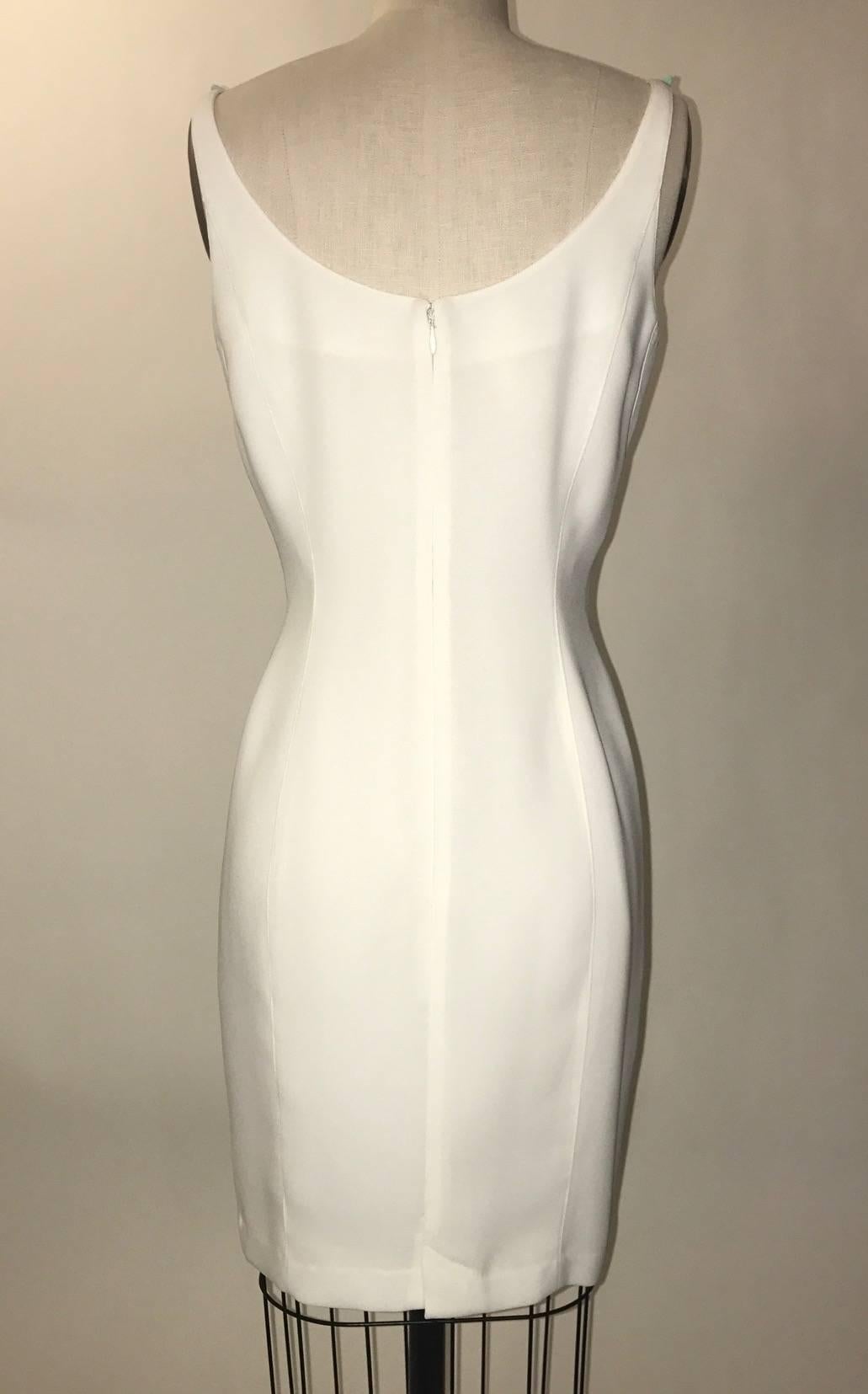 Thierry Mugler white fitted sleeveless crepe dress with light blue and green detailing at top. Back zip and hook and eye.

Crepe, fully lined.

Made in France.

Labelled size FR 38, approximate US 6 but may run small, see measurements.
Bust