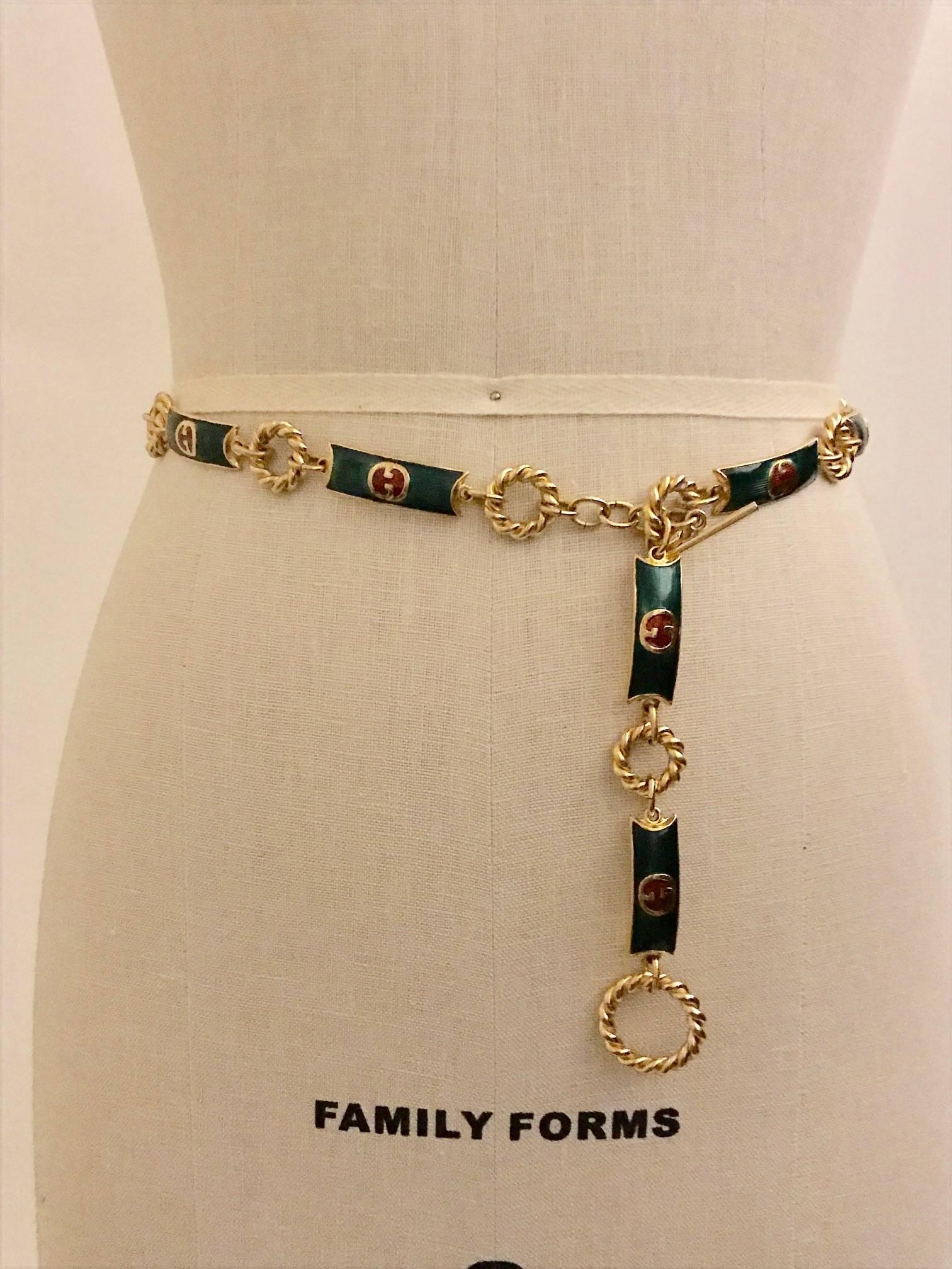 Gucci early 1970s gold tone chain link belt with enamel GG logo adornments. Can also be styled to be worn as a Y necklace.

Signed 'Made in Italy' and 'GUCCI' at adjustable toggle closure. 

Adjustable, fits waist size up to 27
