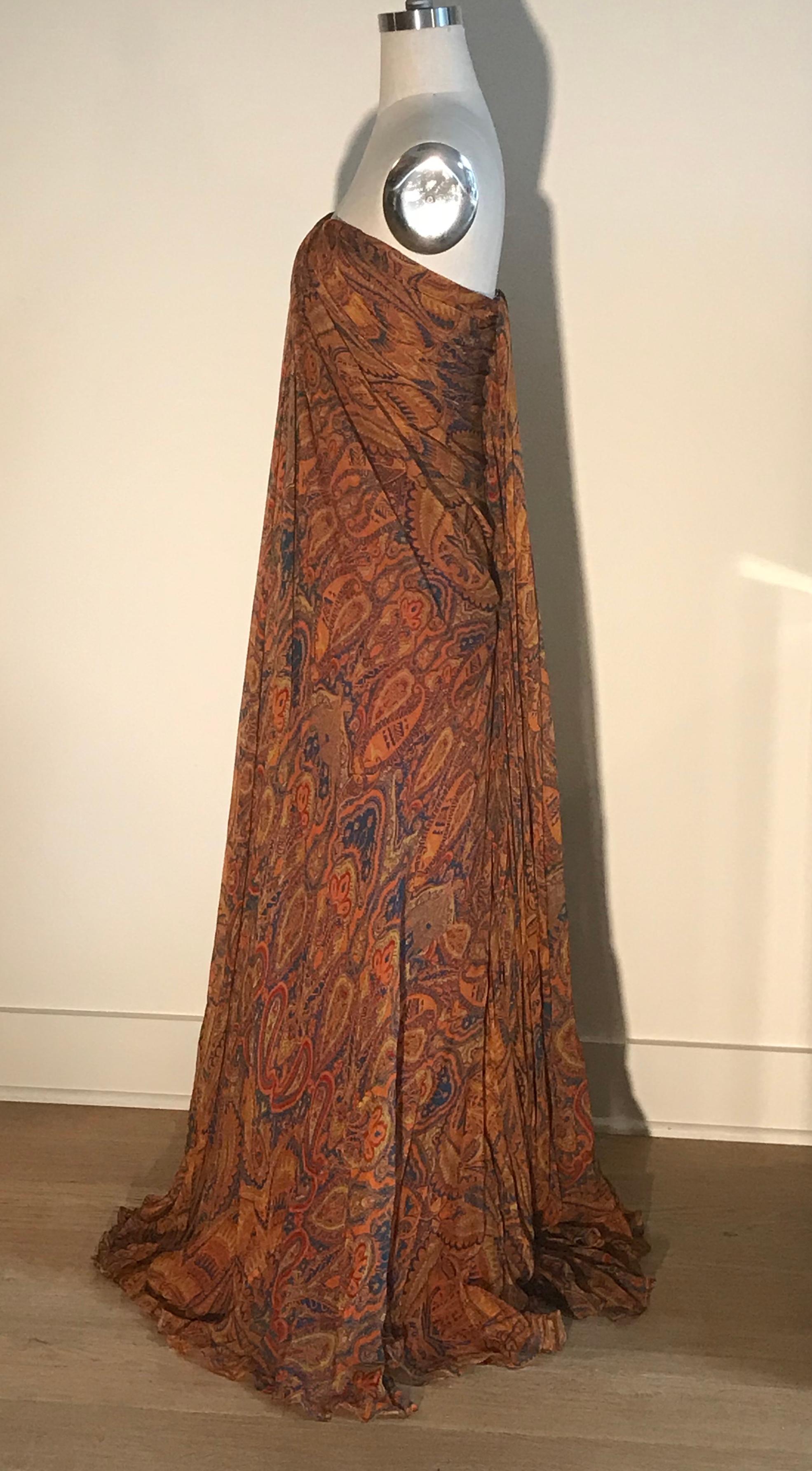 Alexander McQueen orange and blue paisley flowing silk chiffon maxi dress with draped detail. Burgundy lining, built in corset at top. Back zip and hook and eye.

100% silk. 
Fully lined in 76% acetate, 24% silk. 

Made in Italy.

Labelled IT 40,