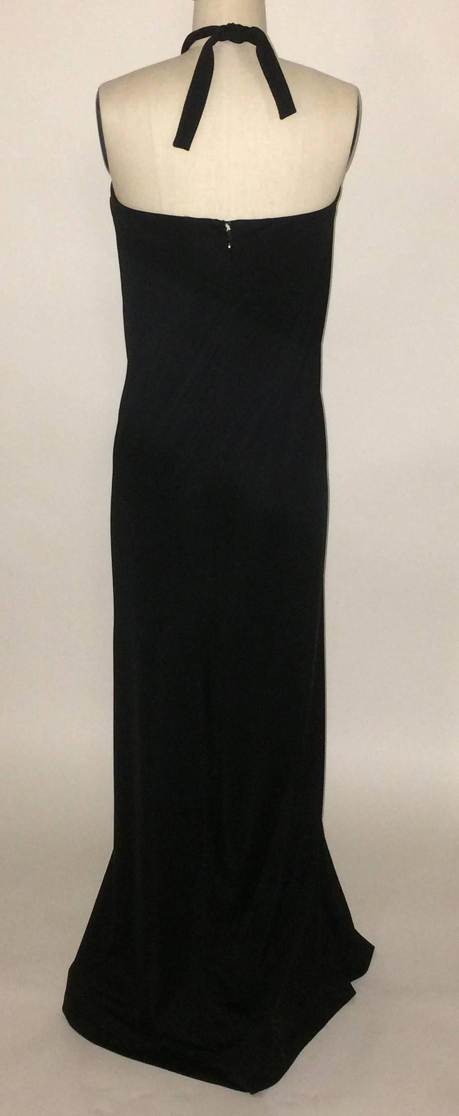 Victor Costa vintage 70's black jersey column maxi dress with beautiful draping detail. Very 'Victor does Halston.'

Tie at back neck. Back zip and hook and eye. Lined at bust.

Size: Not listed. Fits like an XS/S.
Bust (actual bust is open,