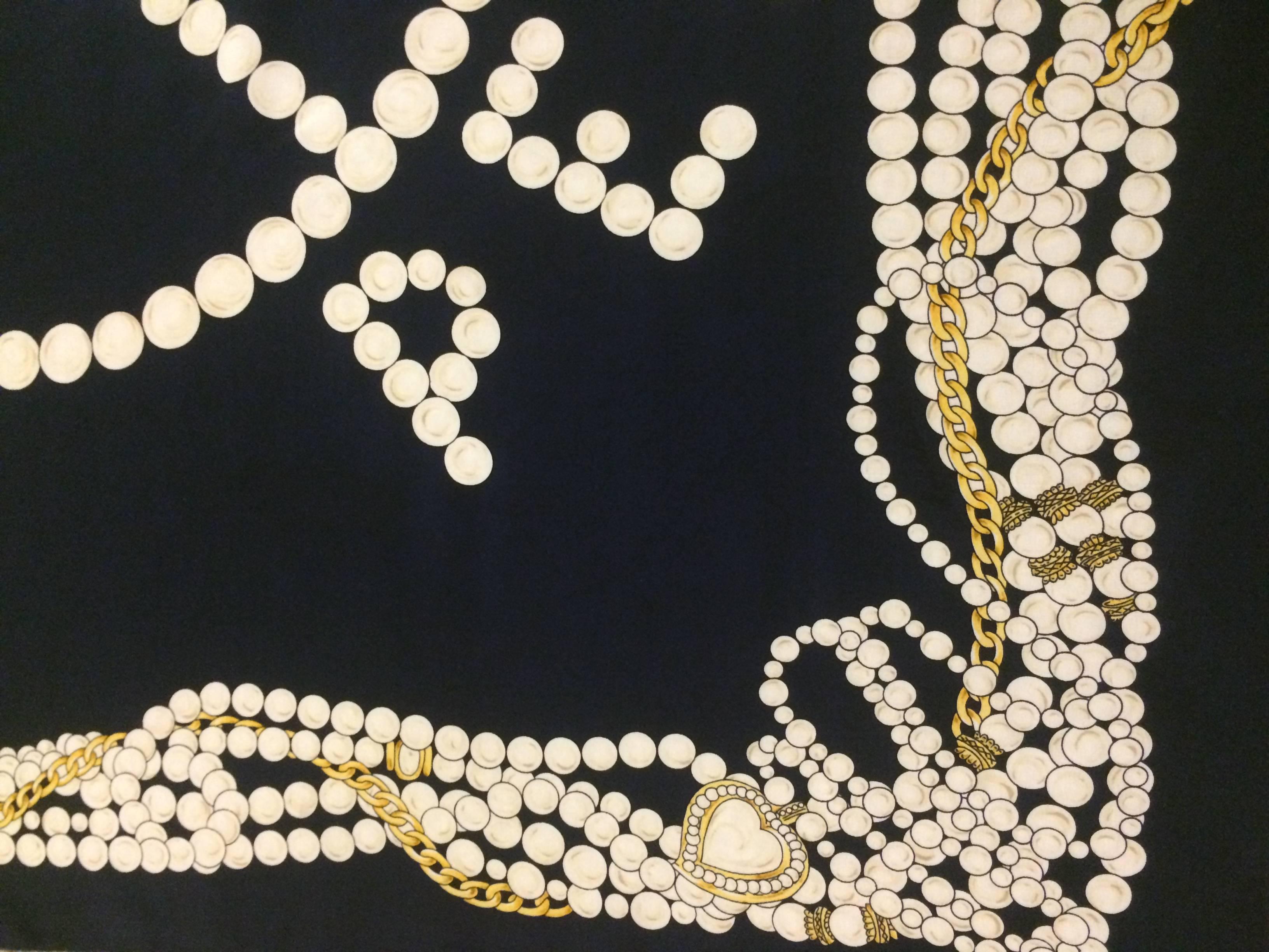 Moschino 1990s 'Peace & Pearls' print silk scarf in deep navy (almost black.)

Measures 32