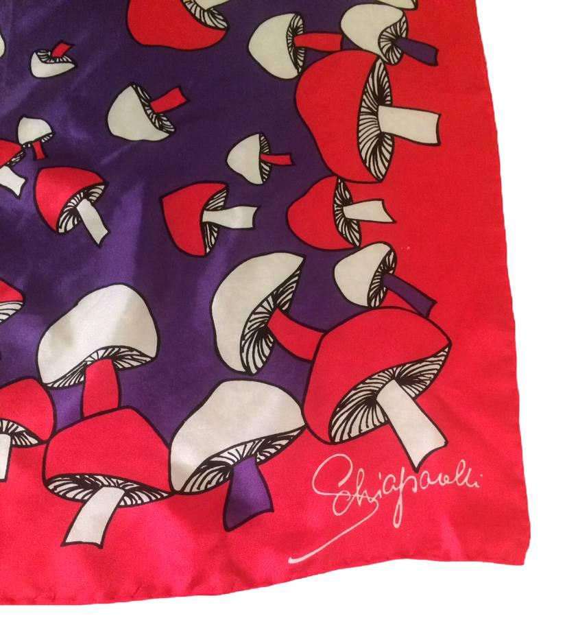 Vintage 70s Elsa Schiaparelli mushroom print silk scarf in red and violet. Hand rolled edges.

Signed Schiaparelli at corner.

Material: Silk.

Size: Approximately 22