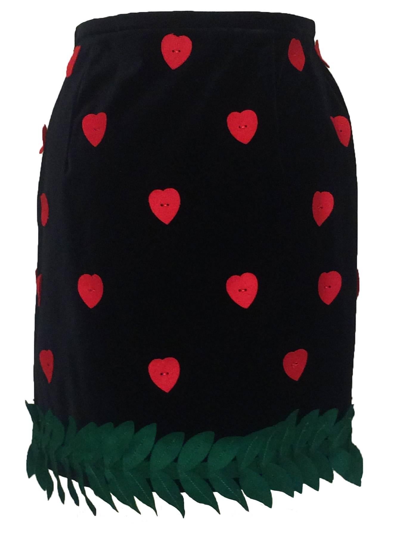 Moschino Cheap & Chic 1990s black velvet skirt featuring cut out hearts and leaves. Side zip.

Made in Italy.

98% cotton, 2% other. 

Size IT 44, US 10. Fits more like modern 4. Has some stretch.
Waist 26