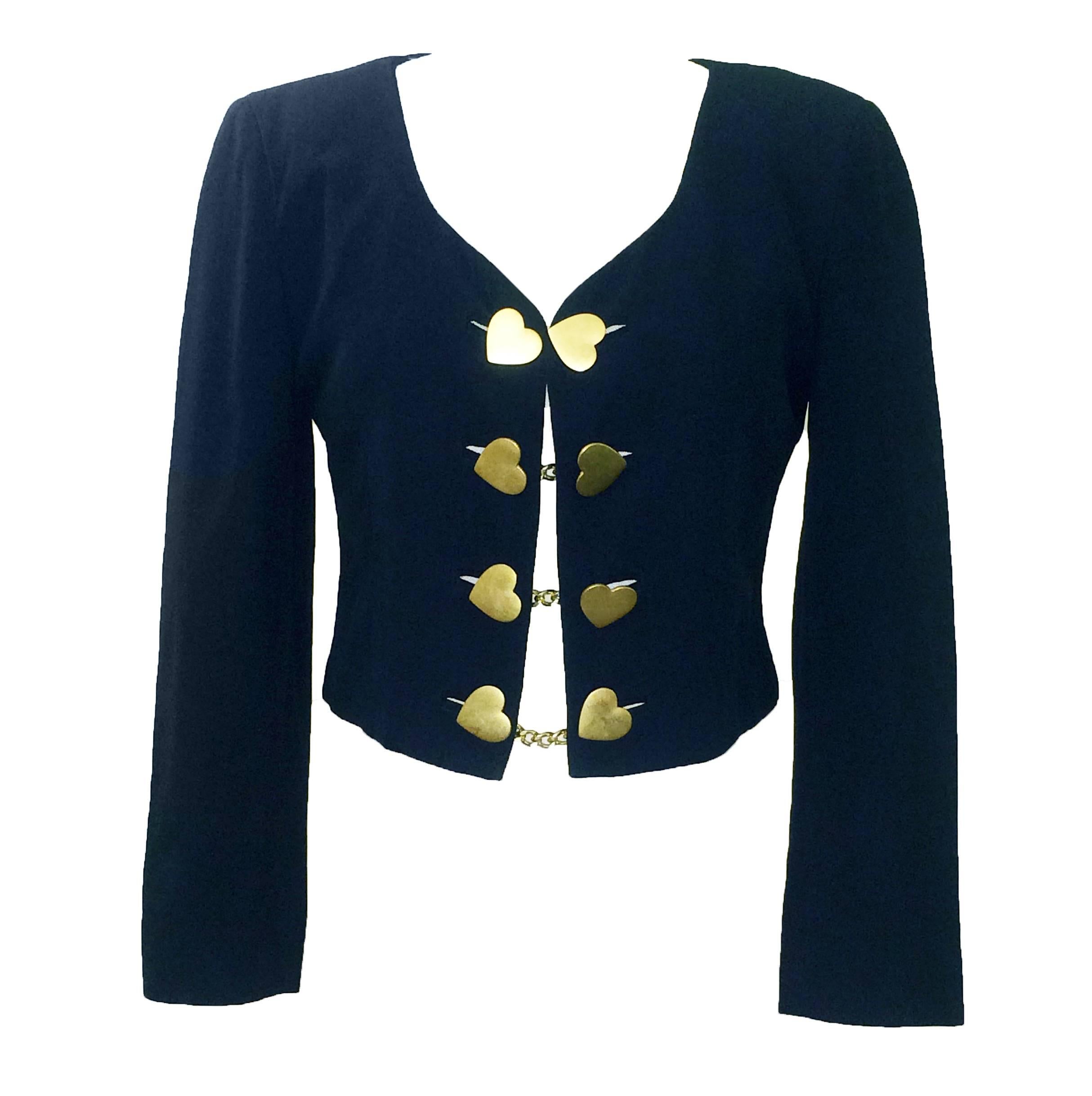 Moschino Couture! Cruise Me Baby 1980's 'Love Boat' jacket with heart chain buttons at front by Franco Moschino. Love boat embroidery at back features sailboat with Italian flag at mast.

Made in Italy.

55% acetate, 45% rayon. 
Fully lined in