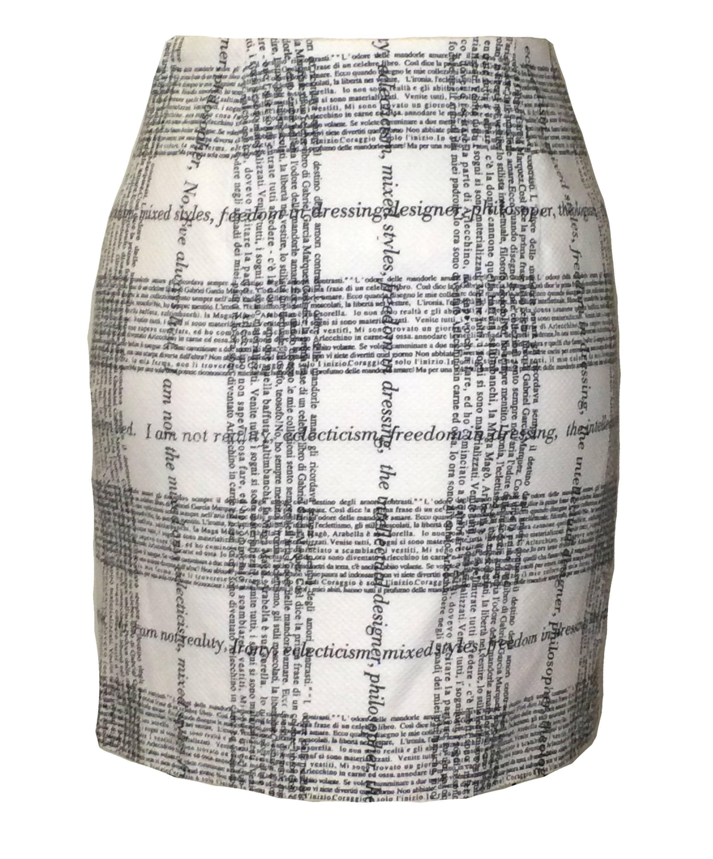 Moschino Cheap & Chic 1990's textured white skirt with black Italian & English typeface forming a plaid design. Side zip and hook & eye.

100% cotton.
Fully lined in 60% acetate, 40% rayon.

Made in Italy.

Size IT 38. Fits like 0-2.
Waist