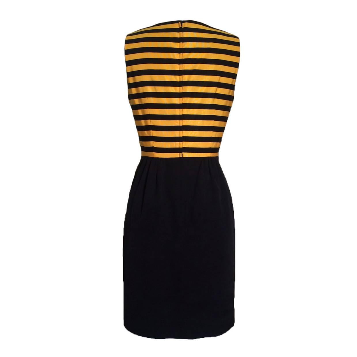 Moschino Cheap & Chic vintage 1980s yellow and black bumble bee stripe dress. Back zip.

Cloth 1: 70% cotton, 30% rayon. 
Cloth 2: 60% cotton 40% rayon.
Fully lined in 60% acetate 40% rayon.

Made in Italy.

Labelled IT 42, US 8. Fits like 