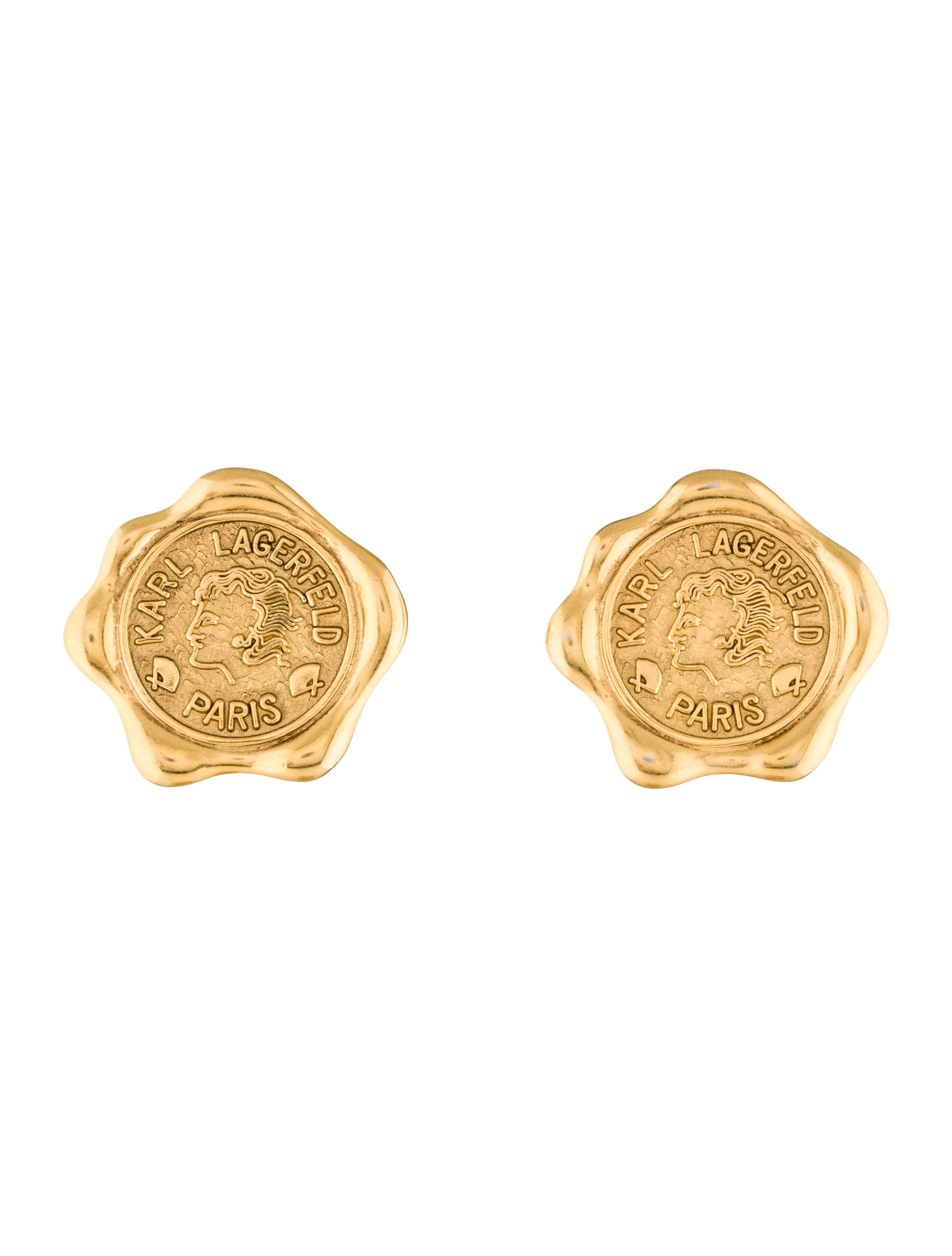 Karl Lagerfeld vintage 90s wax seal earrings in goldtone.
Fronts read Karl Lagerfeld, Paris. Signed 'KL' at backs.

Approximately 1.5