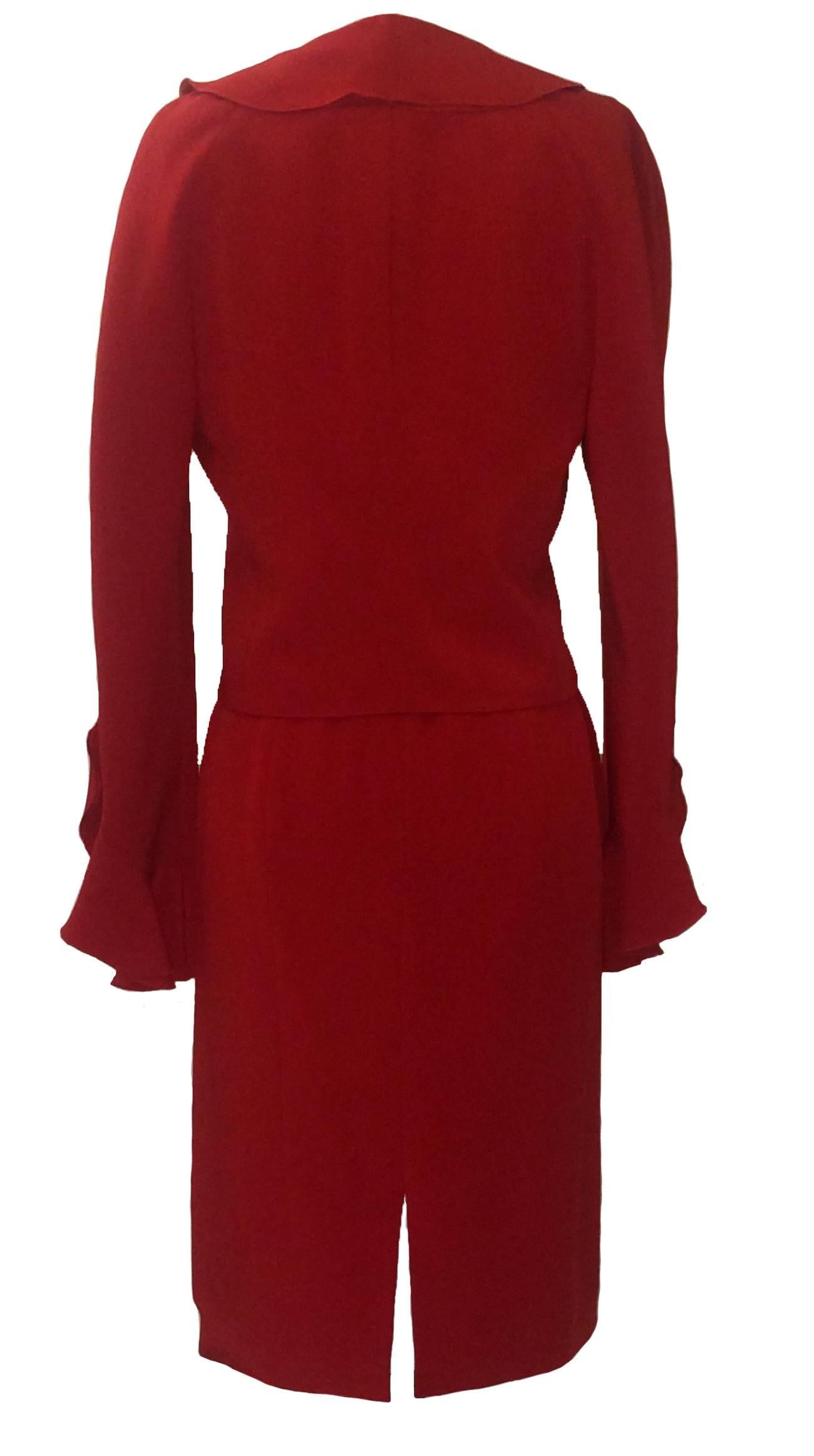 Valentino ruffle detail skirt suit in lipstick red. Button front jacket, back zip on skirt. 

60% acetate, 40% silk.
Jacket lined in same, skirt lined in 100% polyester.

Made in Italy.

Size 8. Runs small, see measurements.
Bust