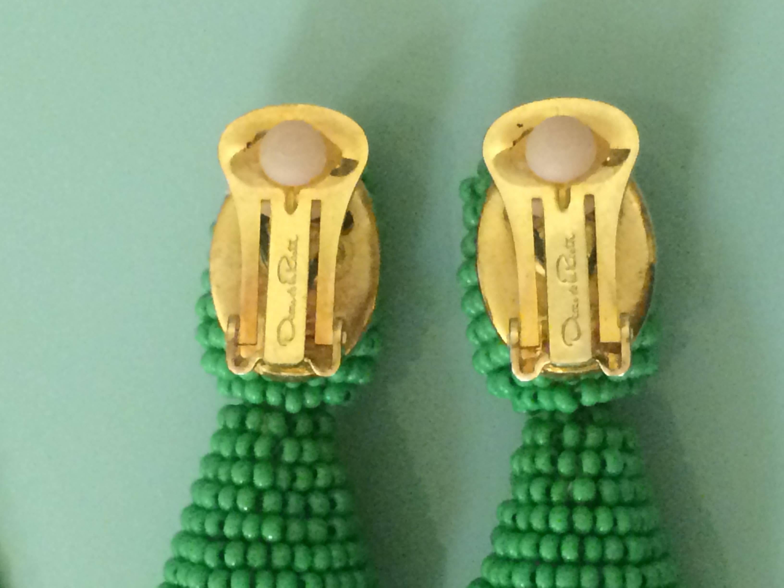 Oscar de la Renta green beaded tassel earrings. Approximately 5 1/4