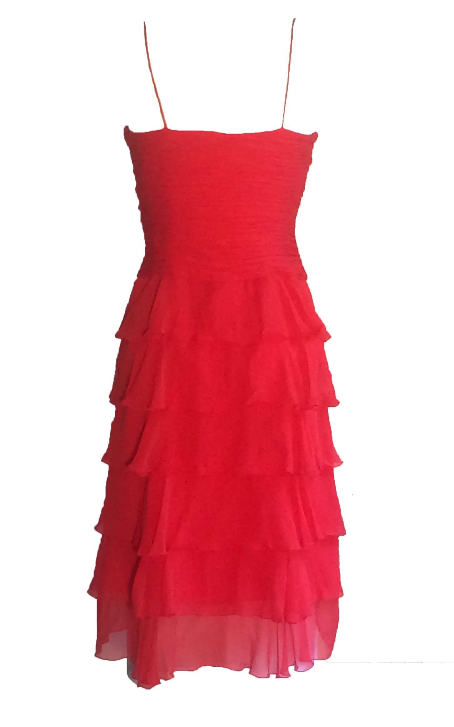 Oscar de la Renta for Neiman Marcus 1990's red silk chiffon dress with spaghetti straps, ruched bodice, and tiered ruffle skirt. Hidden side zip.

No content label, feels like silk. Fully lined.

Made in USA.

Size 4 US. Runs slightly small, see