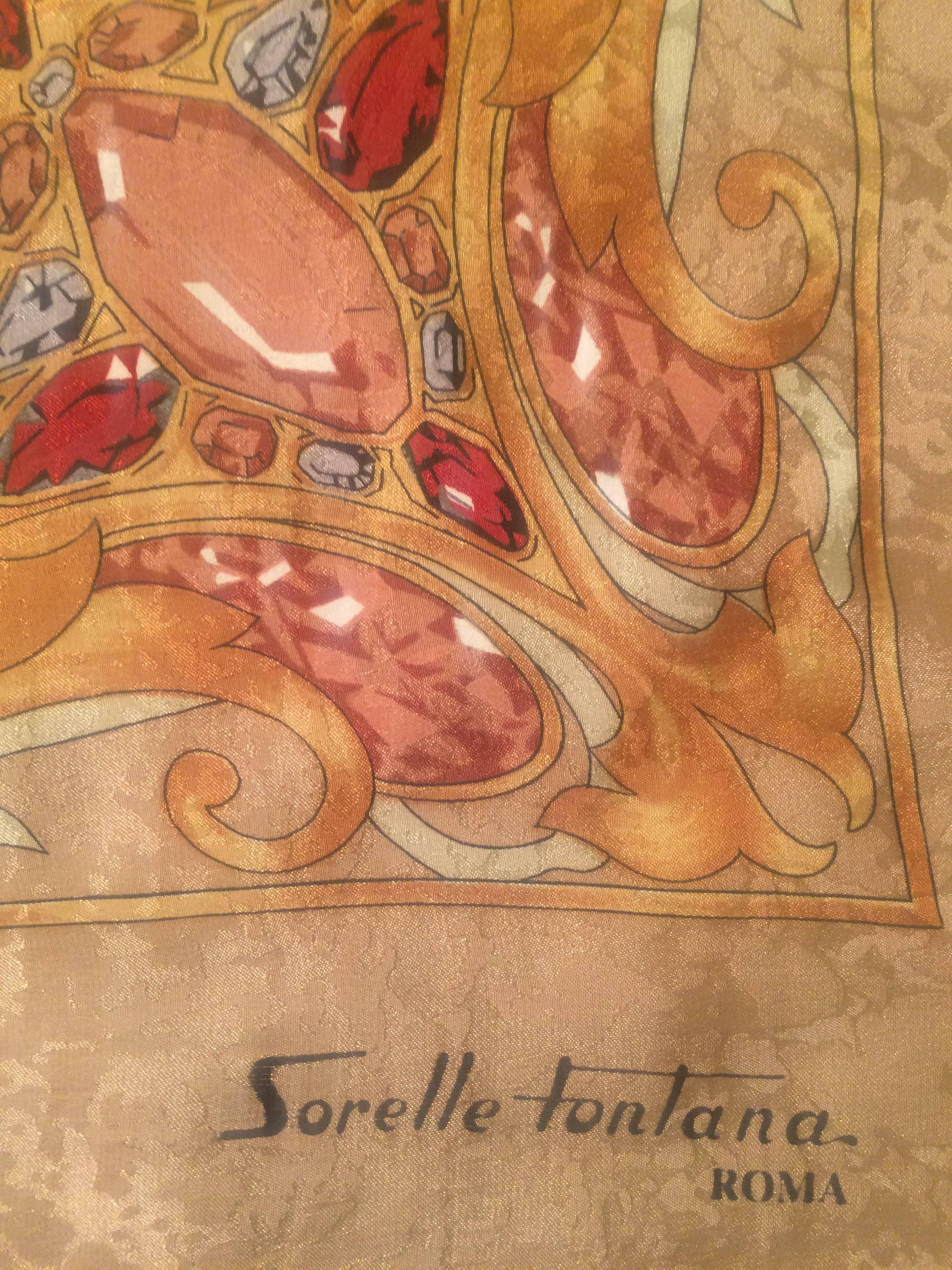 Sorelle Fontana gold silk scarf with leopard and jewel prints throughout. Hand rolled edges. Signed 'Sorelle Fontana, Roma' at corner.

100% silk.

Made in Italy.

Approximately 34" x 34".

Excellent condition, no flaws to note.