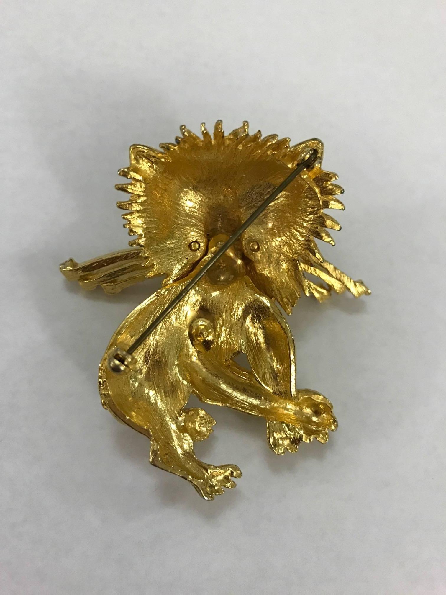 lion brooch pin