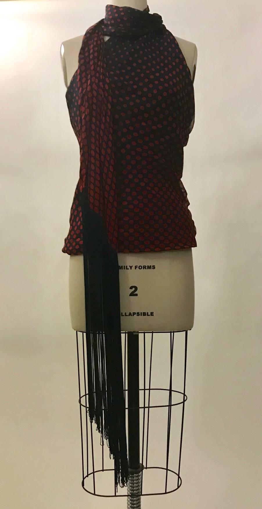Alexander McQueen red and black polka dot halter top with attached scarf that wraps around the neck to close (designed to stay up by just wrapping the scarf, those desiring a little extra security may want to add a brooch.) Long fringed trim at end