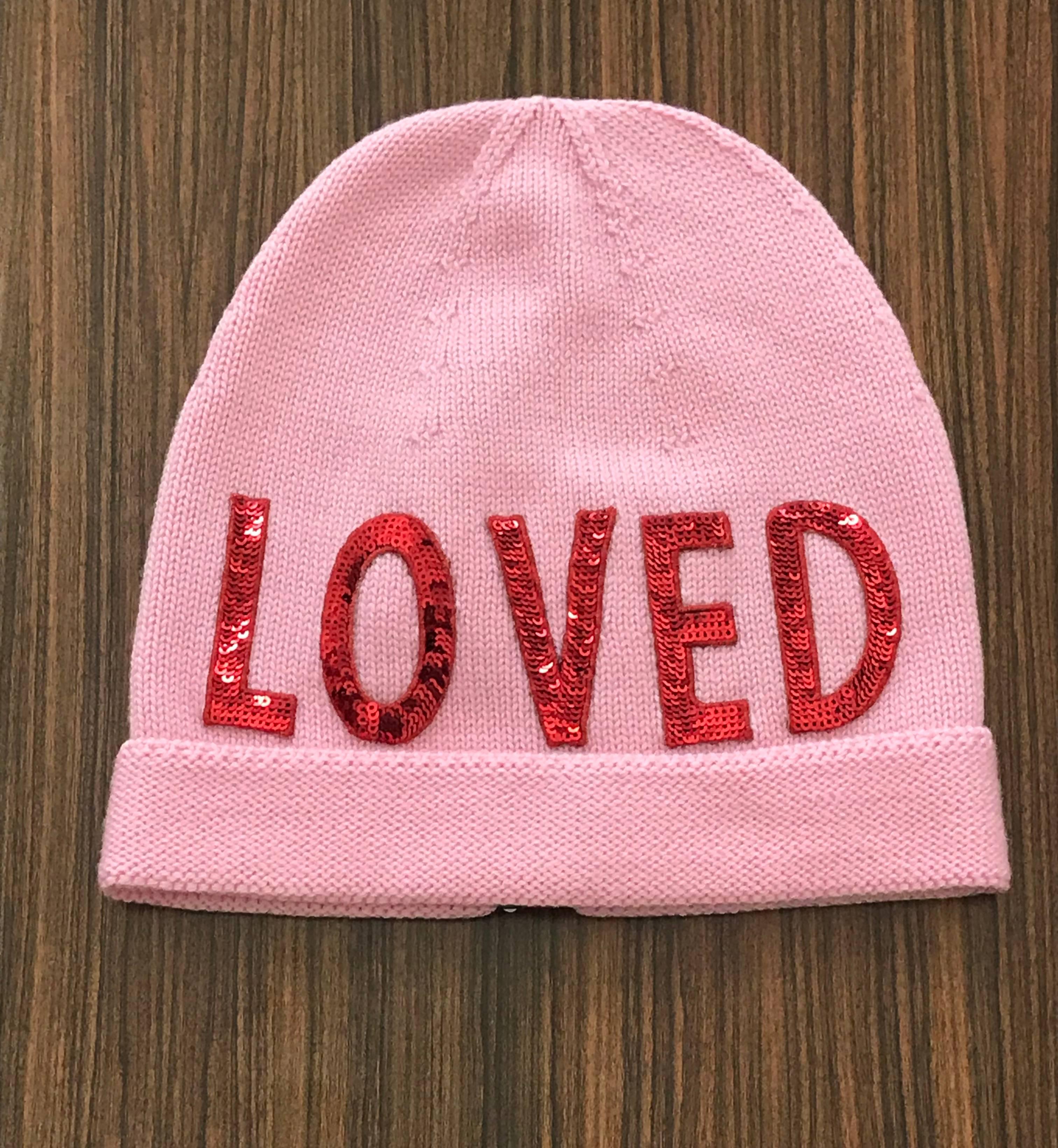 Gucci knit slouchy beanie hat in soft pink wool featuring red sequin loved graphic and Gucci's signature red and green stripe on ribbon at back. In stores now. 

100% wool. 
Loved patch is 100% polyester.

Size S. 

Excellent condition, unworn with