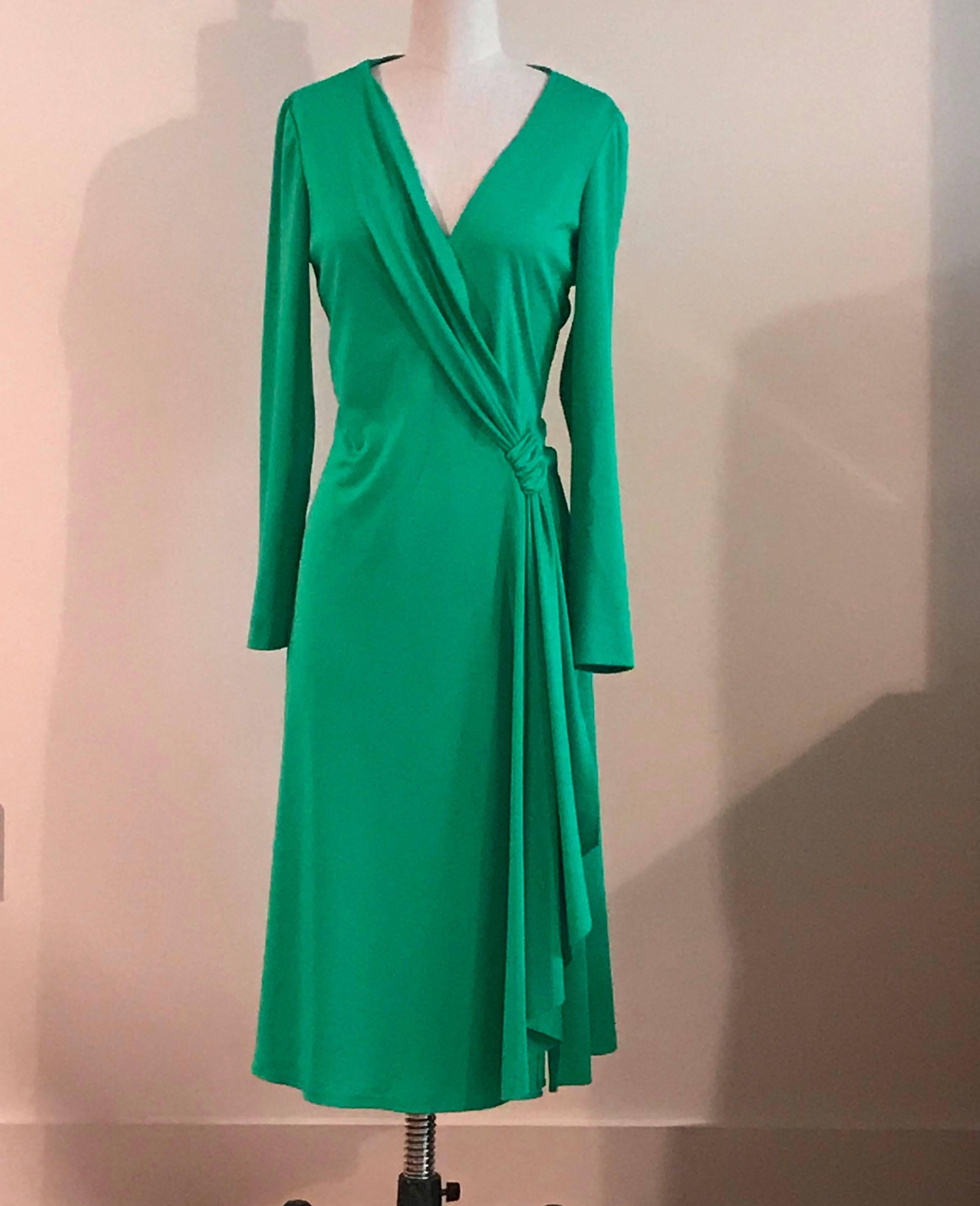 Stephen Burrows vintage 1970s long sleeve green jersey dress with drape detail at front. Signature lettuce edge at hem and drape. Pulls on overhead, no closure.

No content label, feels like mid weight synthetic jersey.

No size tag, best fits S/M,
