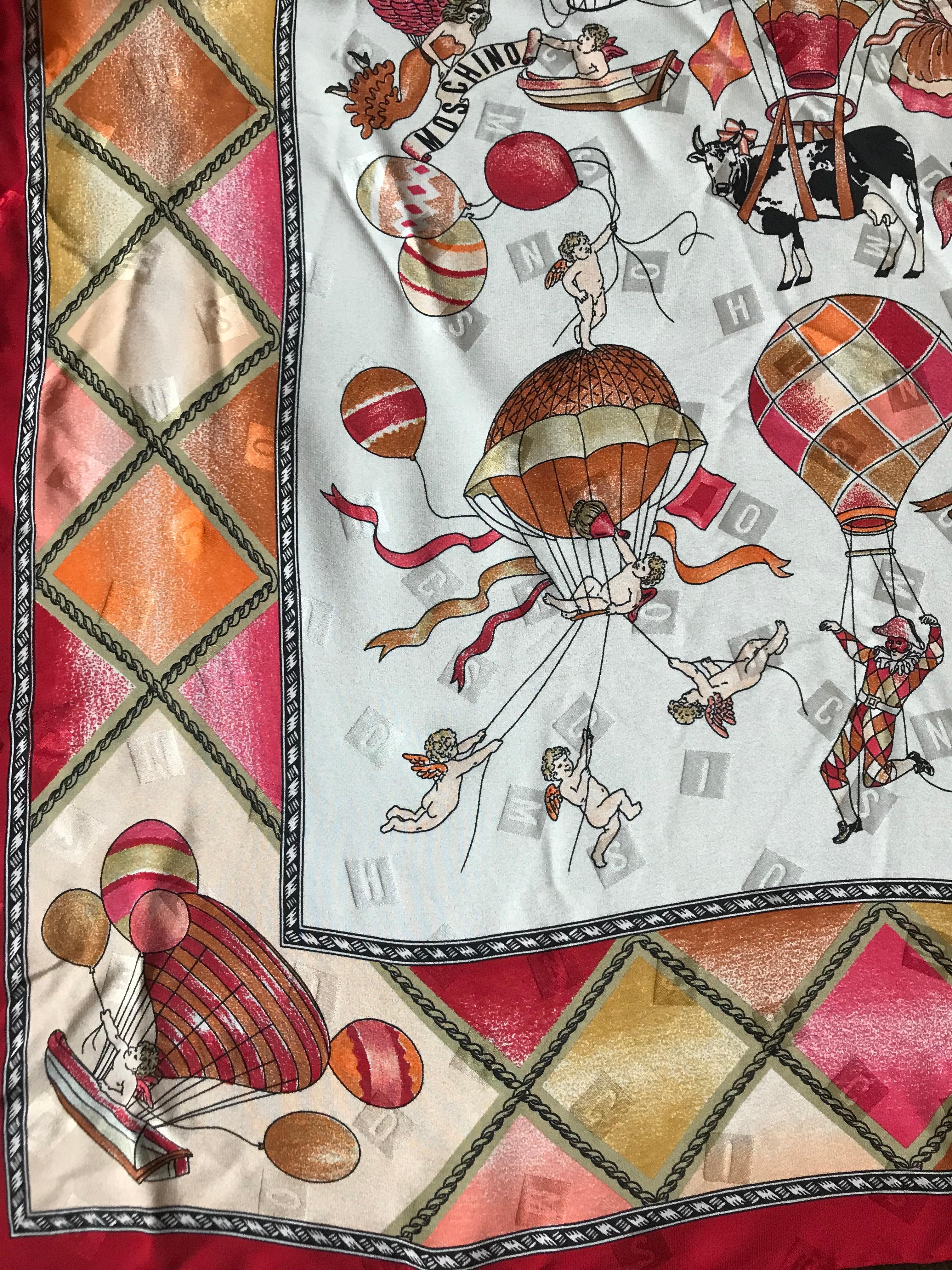 Vintage Moschino silk scarf featuring a wild grouping of hot air balloons, cows, fashion figures, cherubs, and acrobatic looking couples. Weave features blocks spelling M-O-S-C-H-I-N-O throughout. 

100% silk.

Made in Italy.

Measures approximately