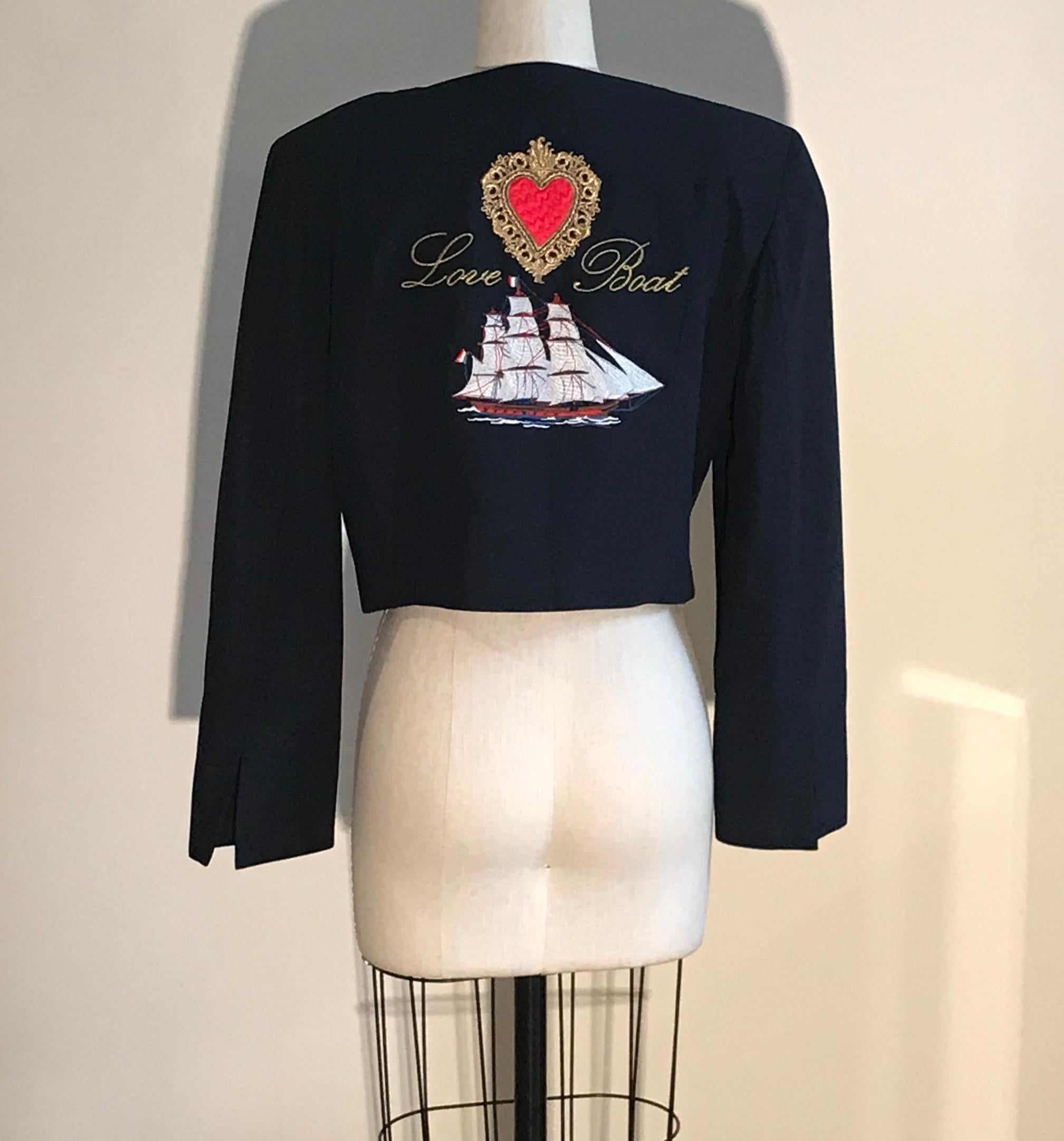 Moschino Couture 1980's 'Love Boat' jacket with double row of gold and faux pearl life-ring chain buttons at front from one of Franco Moschino's 'Cruise Me Baby' resort collections. Love boat embroidery at back features sailboat with Italian flag at
