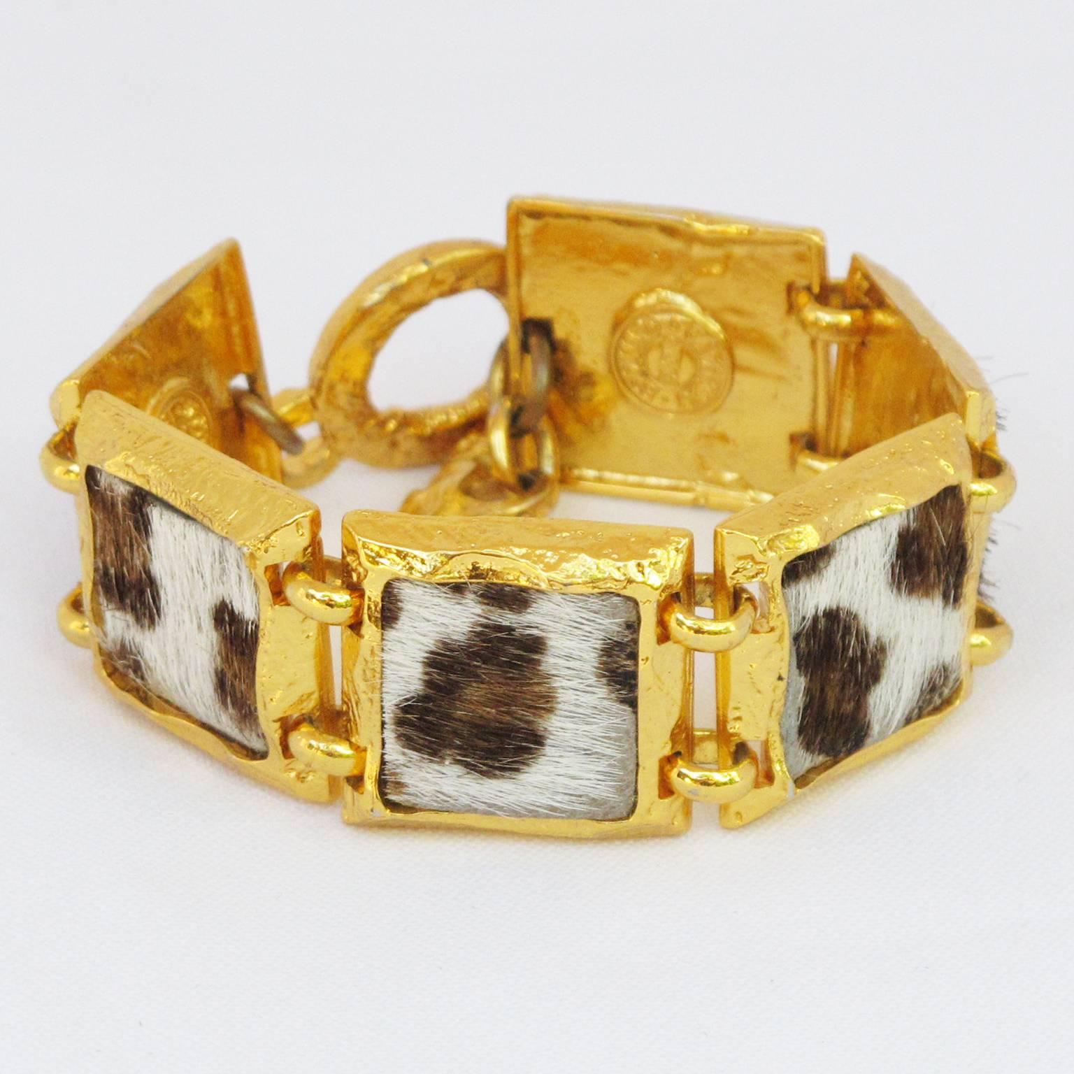 Vintage EDOUARD RAMBAUD Paris Link Bracelet. Chunky geometric square shape with gilt metal all textured topped with pony skin faux fur in a leopard pattern. Signed at the back by this wellknown French Designer. Toggle closing clasp. Excellent