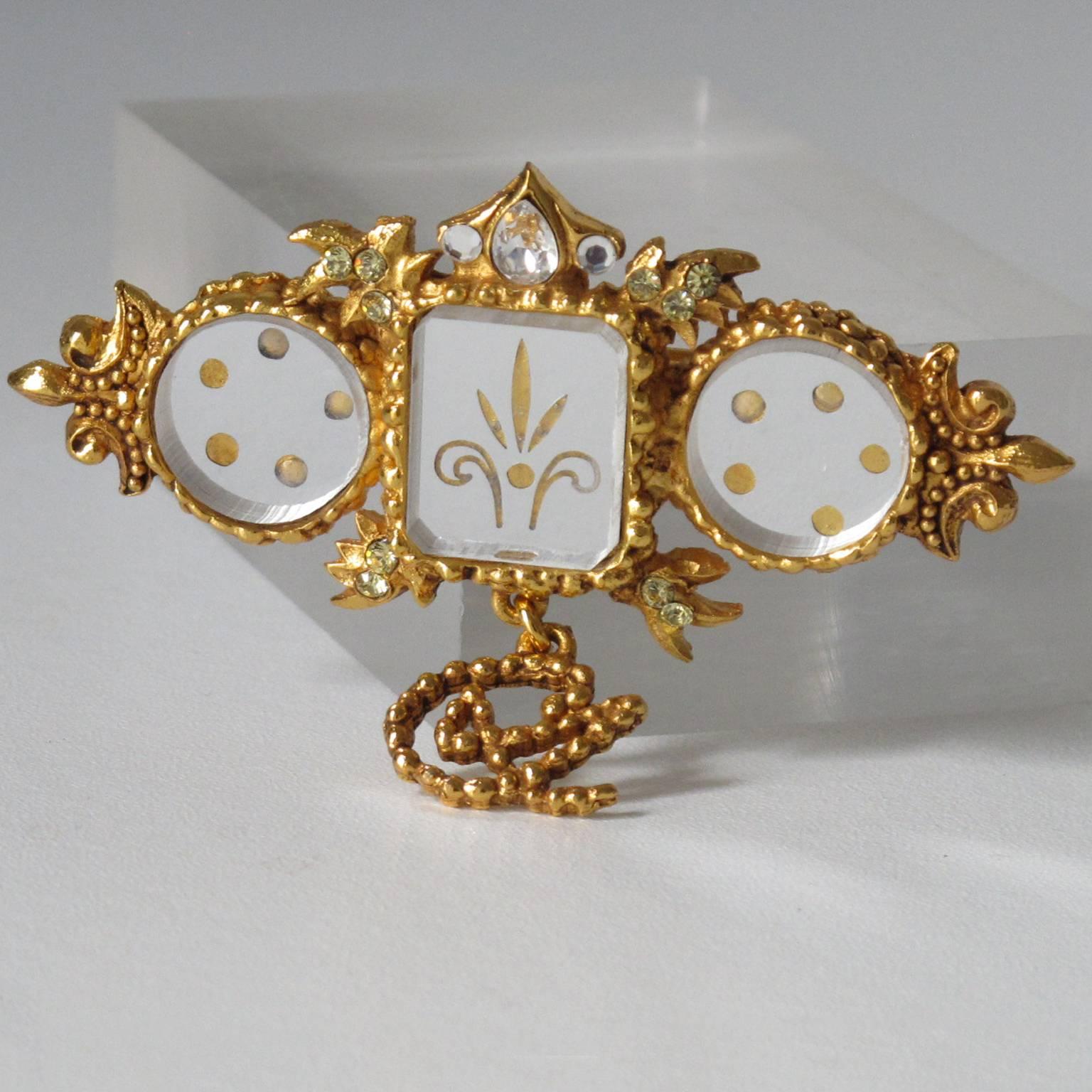 CHRISTIAN LACROIX Paris signed Baroque Pin Brooch. Elegant rare couture dangling shape, gilt metal all textured, ornate with CL logo charm and topped with etched Venetian mirrors and tiny rhinestones in champagne color. Signed at the back with