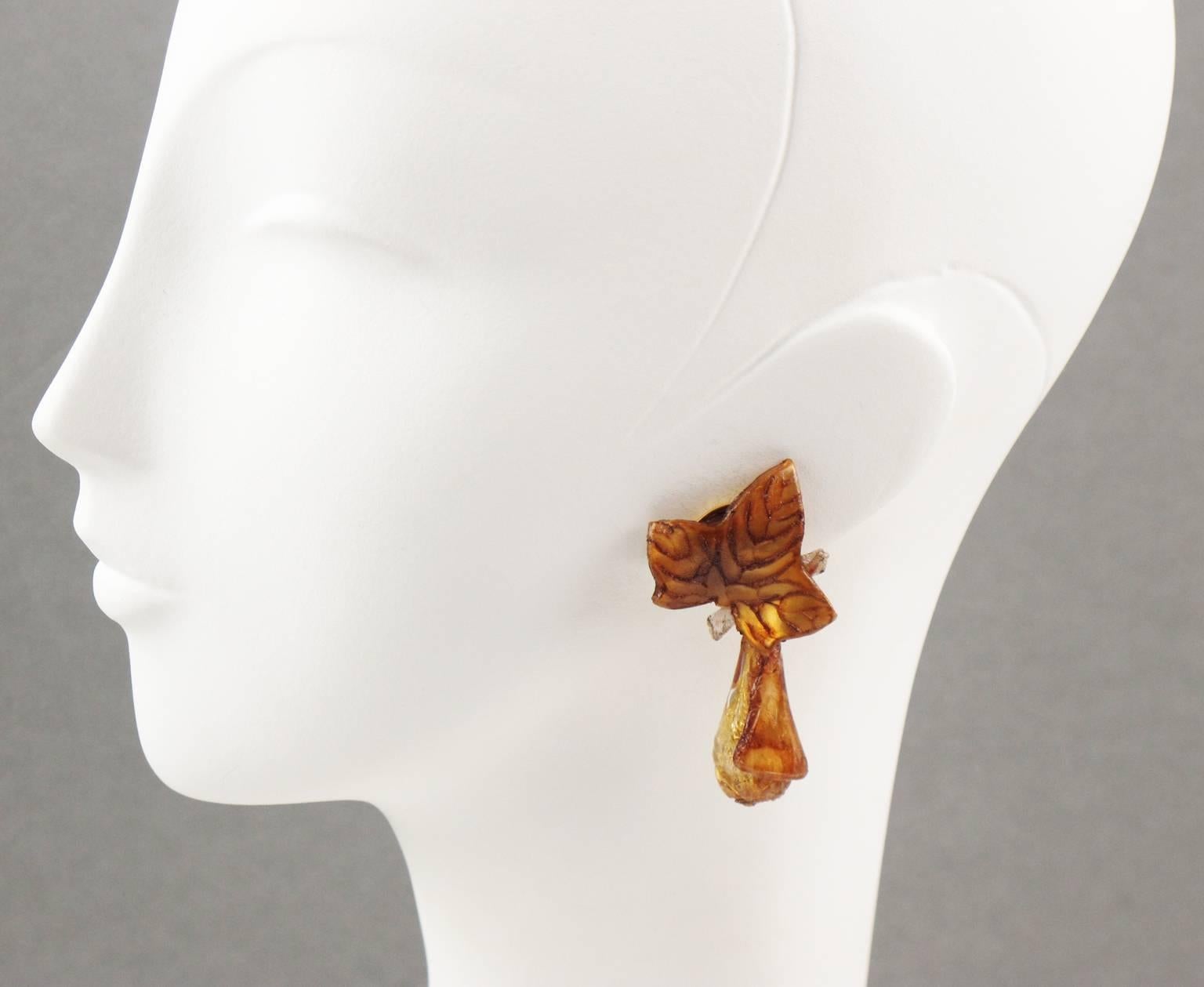 French Jewelry Designer FRANCOISE MONTAGUE Paris clip on Earrings. Vintage elegant large dangle shape, in resin or Talosel, featuring dimensional carved leaf with large drop bead. Great assorted fall bronze tones of caramel, sepia, gold foil and