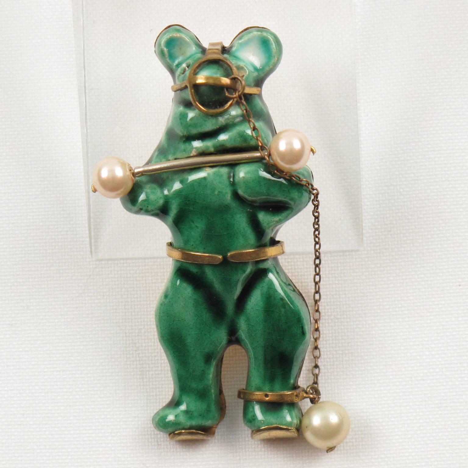 Extremely rare vintage green glazed ceramic or terracotta bear pin brooch designed by Lucien Neuquelman (1909 - 1988) for Elsa Schiaparelli (1890 - 1973). 
In 1938, Elsa Schiaparelli was the first to give a theme to her collections from the early