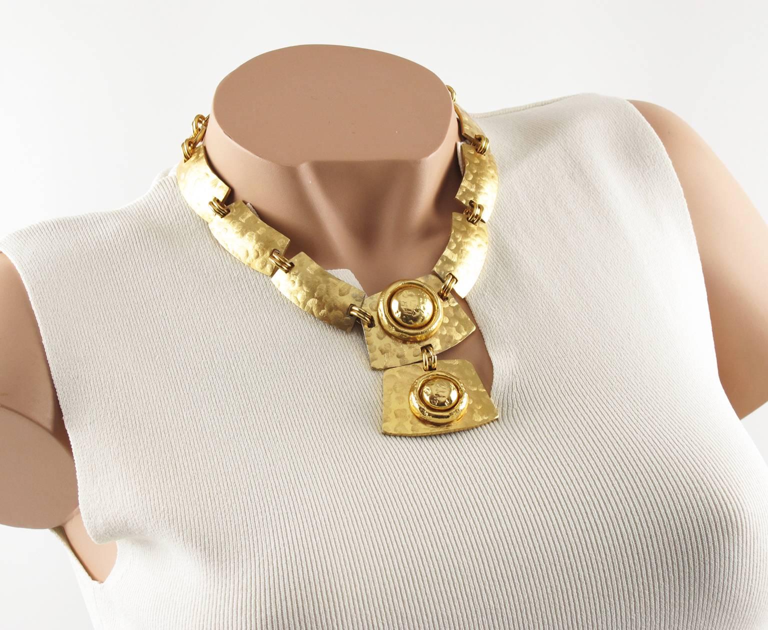 Rare French manufacturer Orena Paris gilded aluminum choker necklace. Elegant around the neck shape with slightly hammered and textured geometric elements with central double decker pendant. Chain with toggle clasp closing for length flexibility.