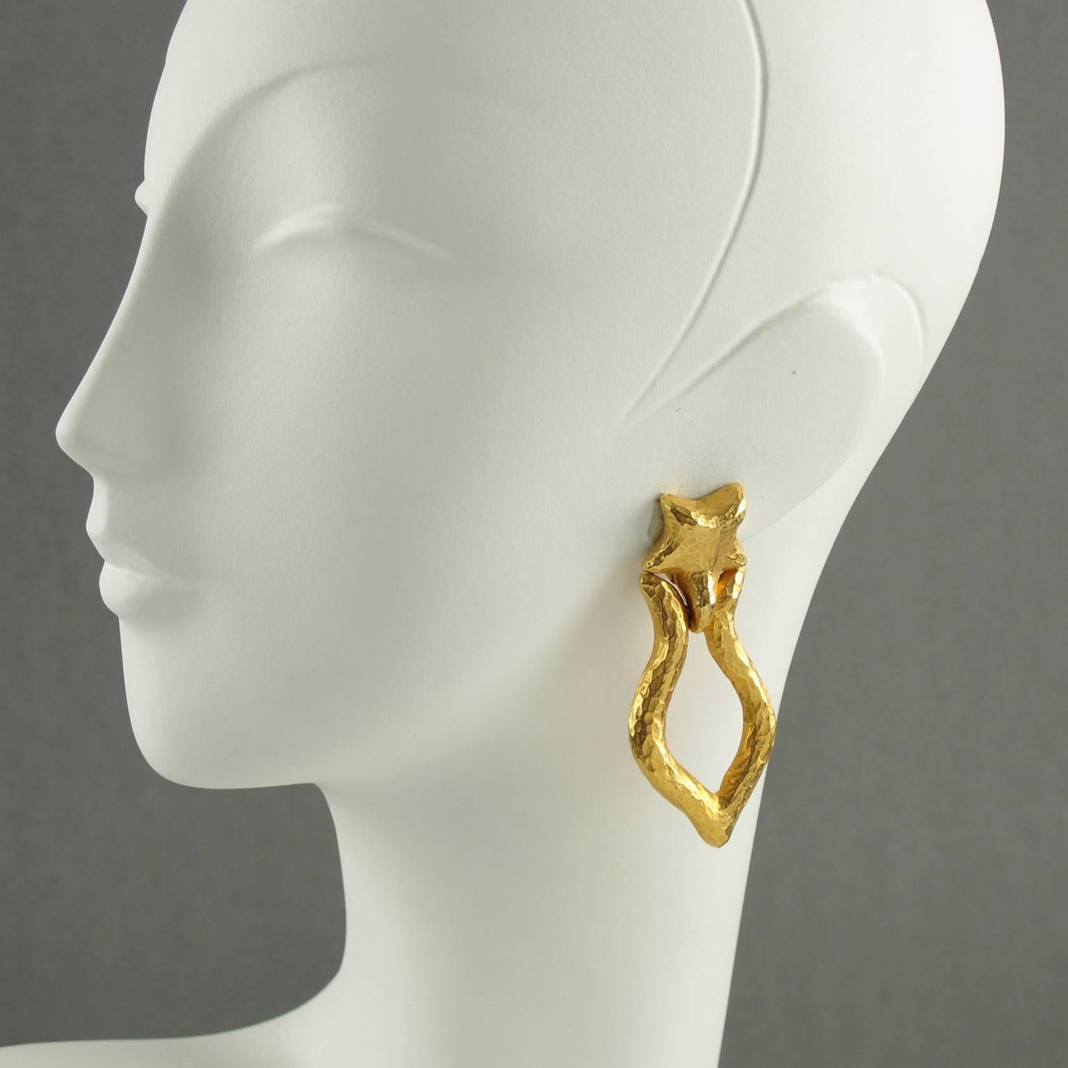 Rare French designer Alexis Lahellec Paris signed clip on earrings. Unusual modernist design with heavy gilt metal door knocker dangling shape, metal all hand-hammered with satin finish aspect. Signed underside: 