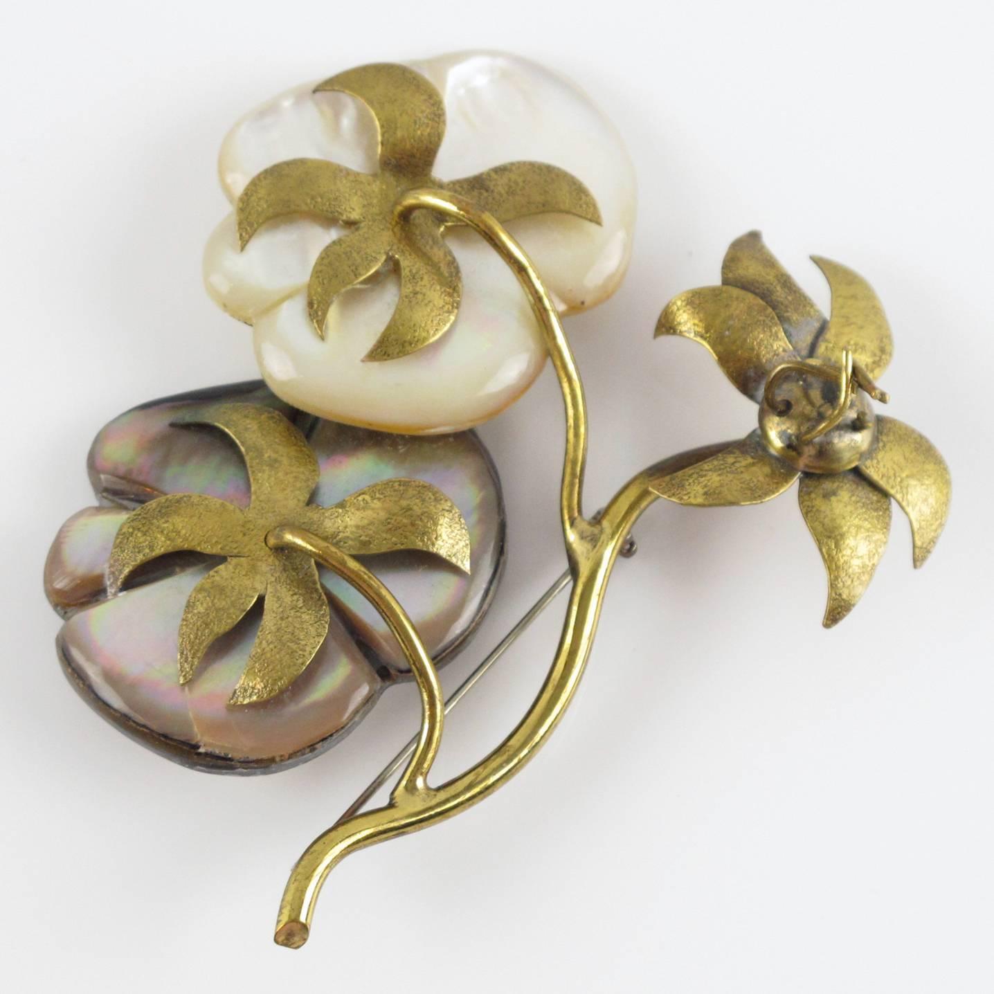 Vintage 1980s floral Brooch Pin by Fabrice, Paris. Large gilt brass flowers design with dimensional hand raised and detailed leaves, compliment with mother of pearl accent. Marked at the back 