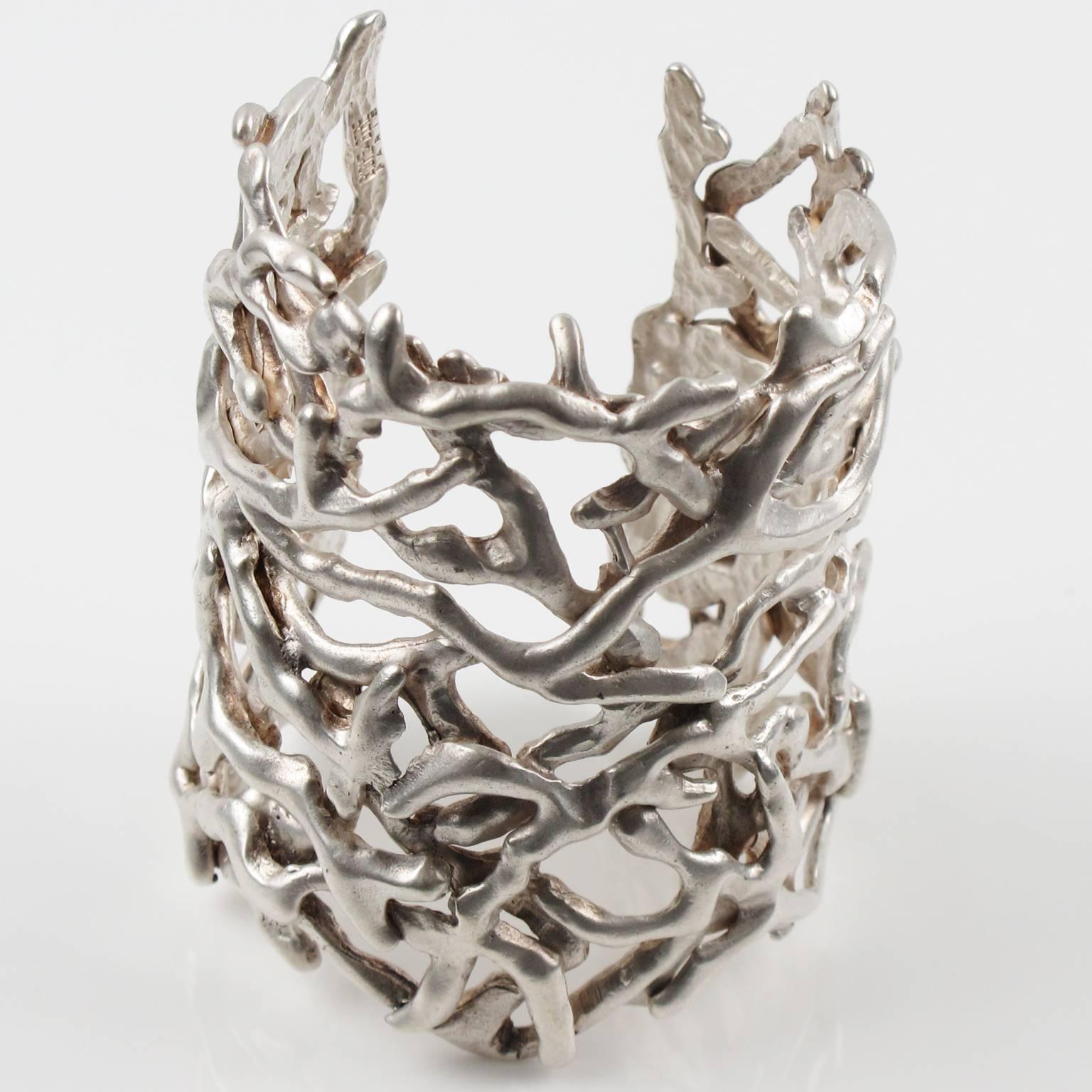 Stunning vintage modernist silver plate cuff bracelet by Nelly Biche de Bere Paris. Chunky massive oversized slave cuff bangle with brutalist carved and see thru design, featuring intricate branches. Marked in the inside: 'Biche de Bere' and