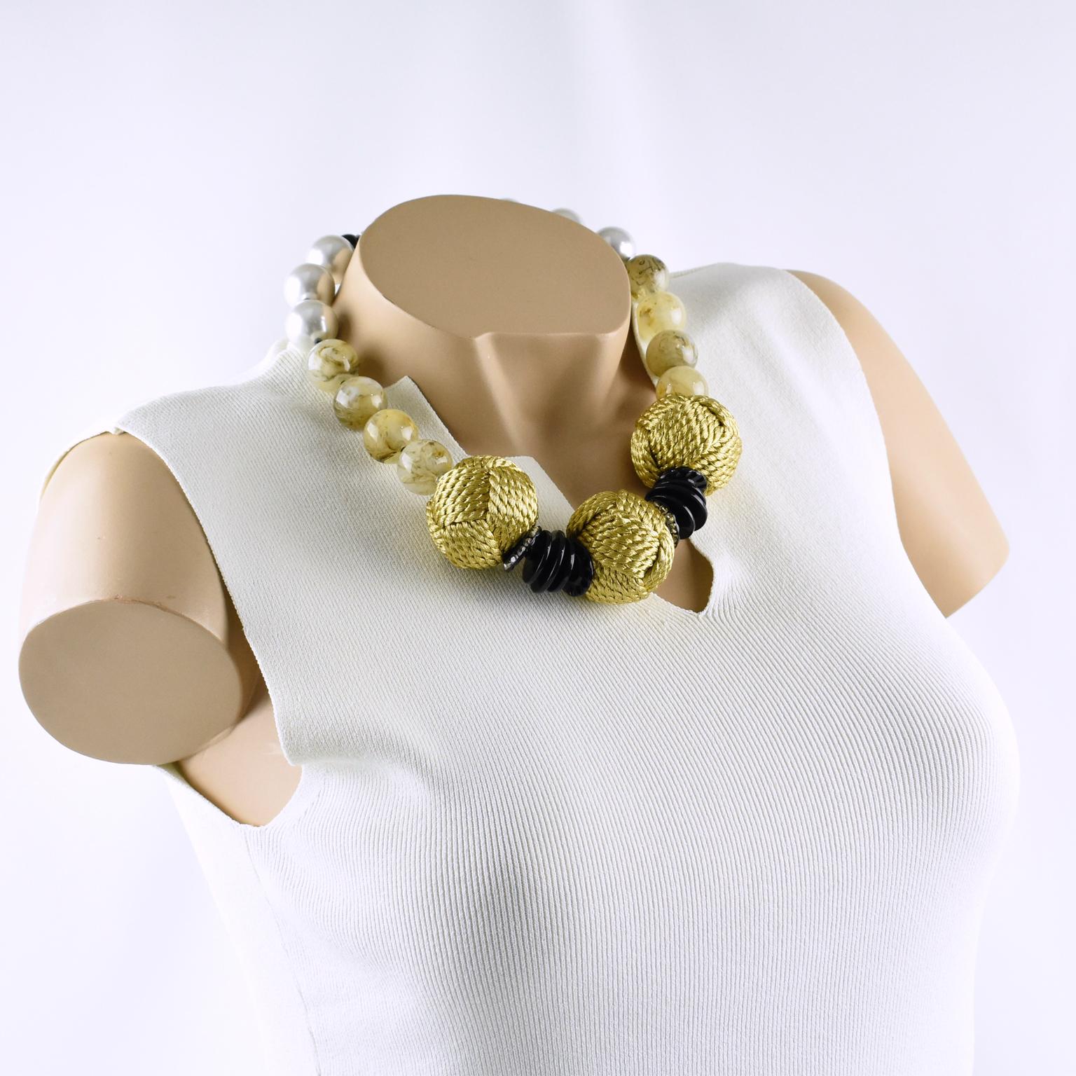 Lovely Angela Caputi, made in Italy choker beaded necklace. Large pearl imitation round beads with yellow smoked Lucite beads, compliment with extra large gilded braided thread beads. Her matching of colors is always extremely classy, perfect for