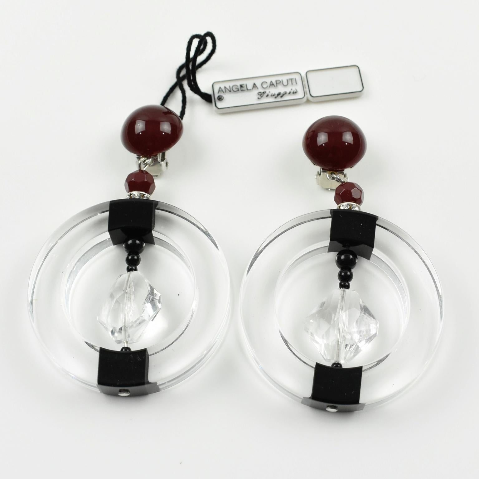 Angela Caputi Large Hoop Dangling Black and Clear Resin Clip On Earrings In Excellent Condition In Atlanta, GA