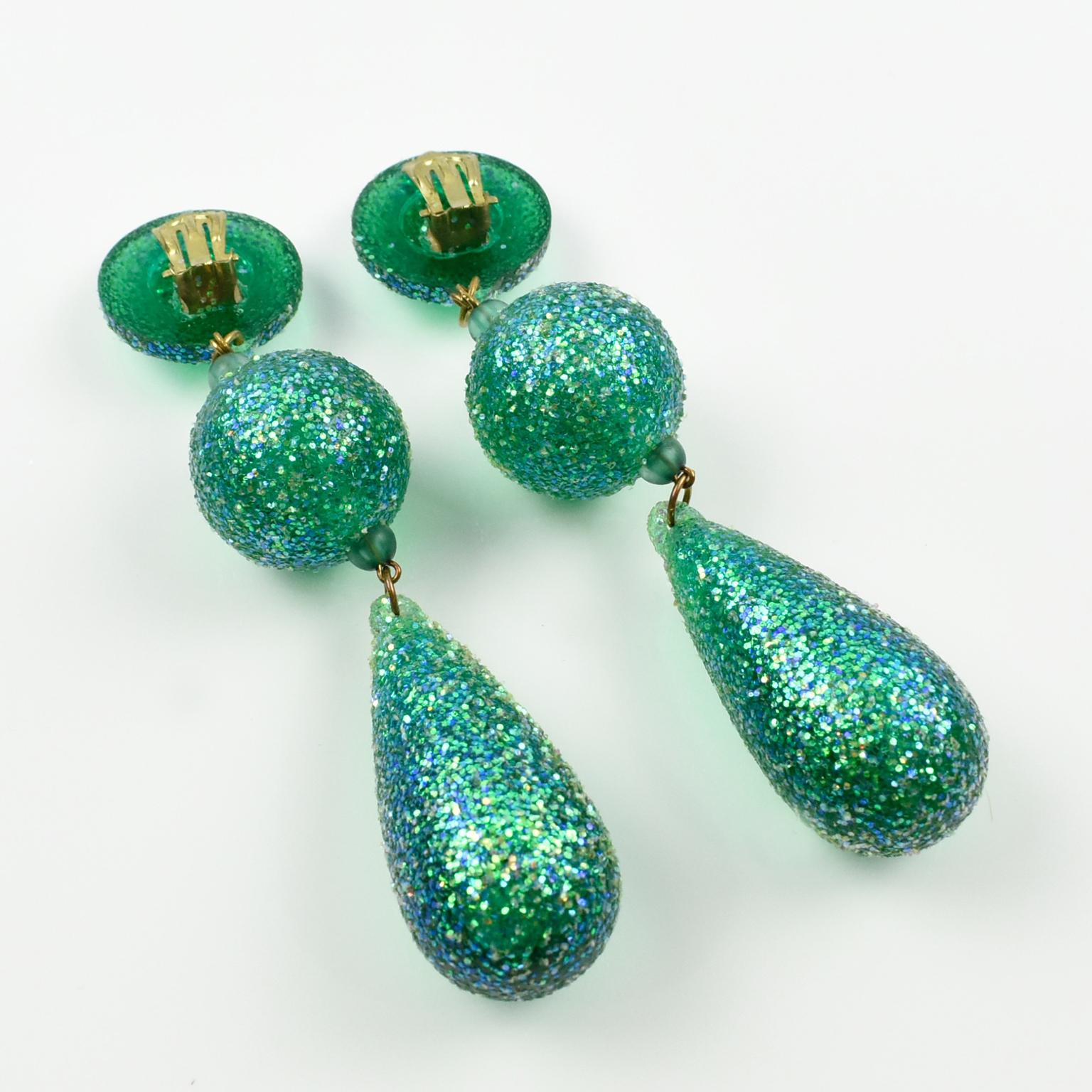 1980s Dancing GoGo Girl Long Dangling Turquoise Glitter Lucite Clip on Earrings  In Excellent Condition In Atlanta, GA