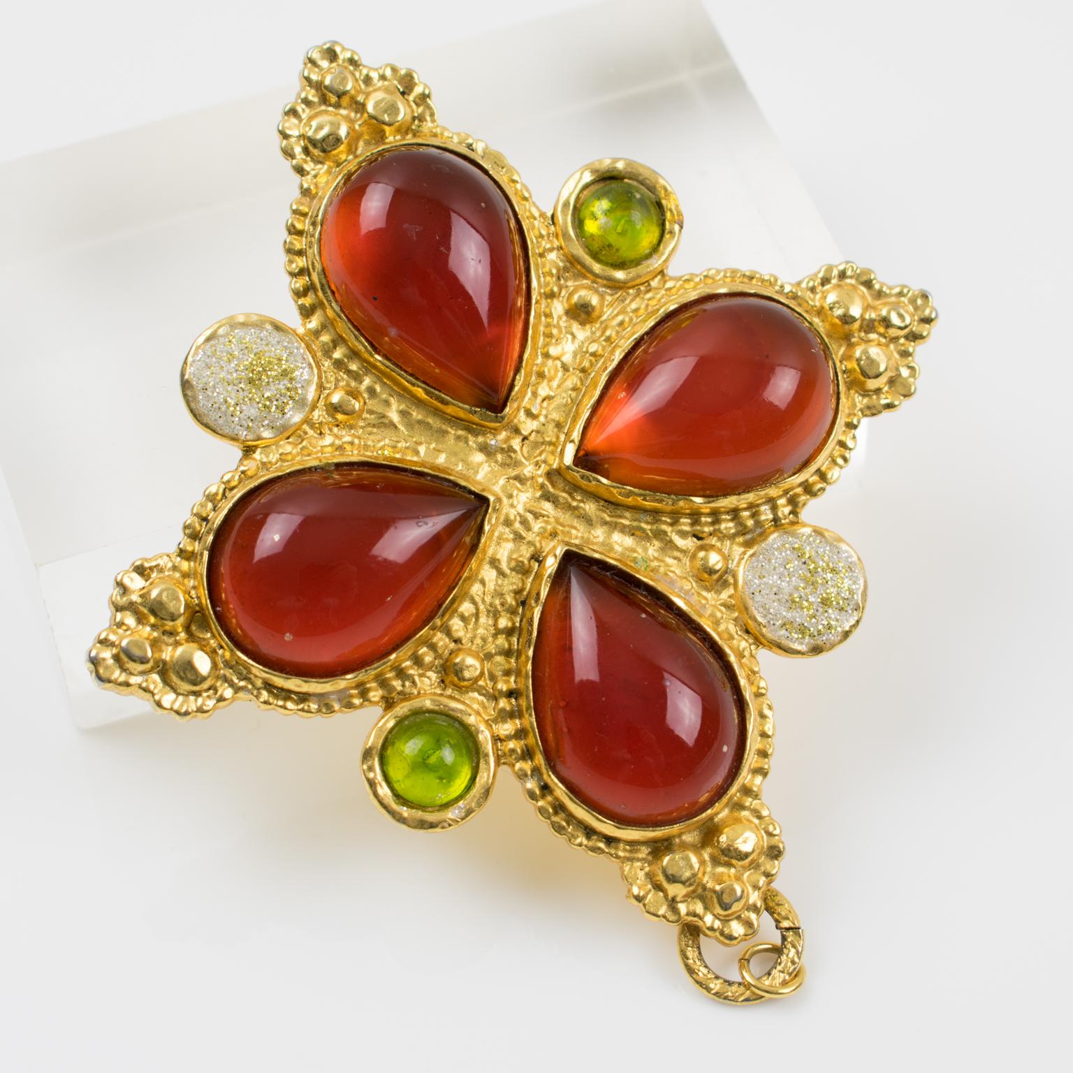 French designer Edouard Rambaud Paris signed pin brooch. Featuring oversized dimensional square cross shape with shiny gilded metal all textured and ornate with 4 poured glass cabochons in red tea amber color. Also compliment with poured glass