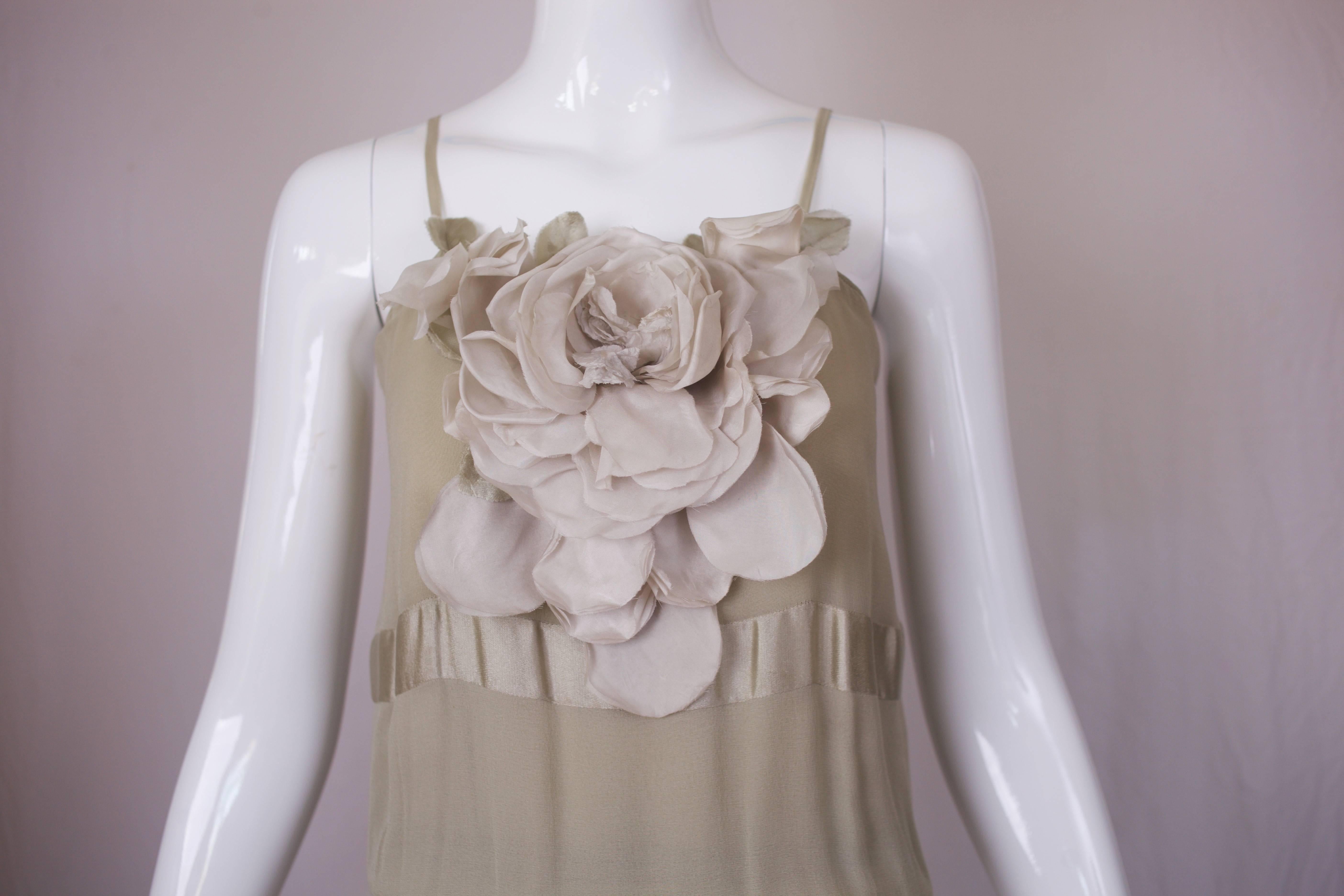 Romantic 1970's Chloe silk chiffon and silk charmeuse banded gown with camisole bodice, elastic waist and floral detail at center front. Color could be described as a very very pale sage green/putty. In excellent condition with no size tag so please