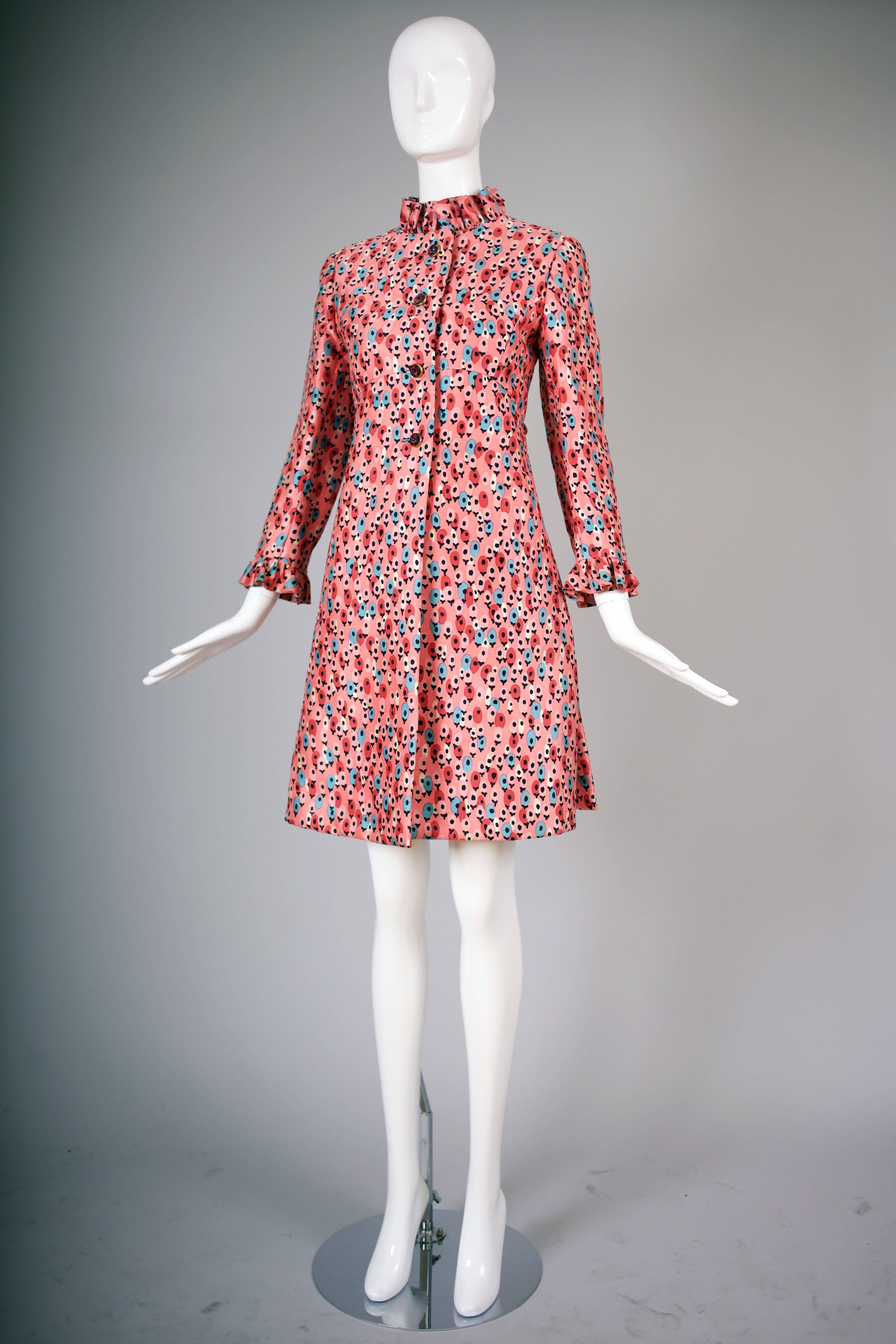 1960's Bill Blass for Maurice Rentner silk coat dress with ruffled neck and cuffs, deep pleats at either side and purple crystal buttons down the front. Vintage tag size 8 but it is smaller - more suited to a 4 or small 6. Please consult