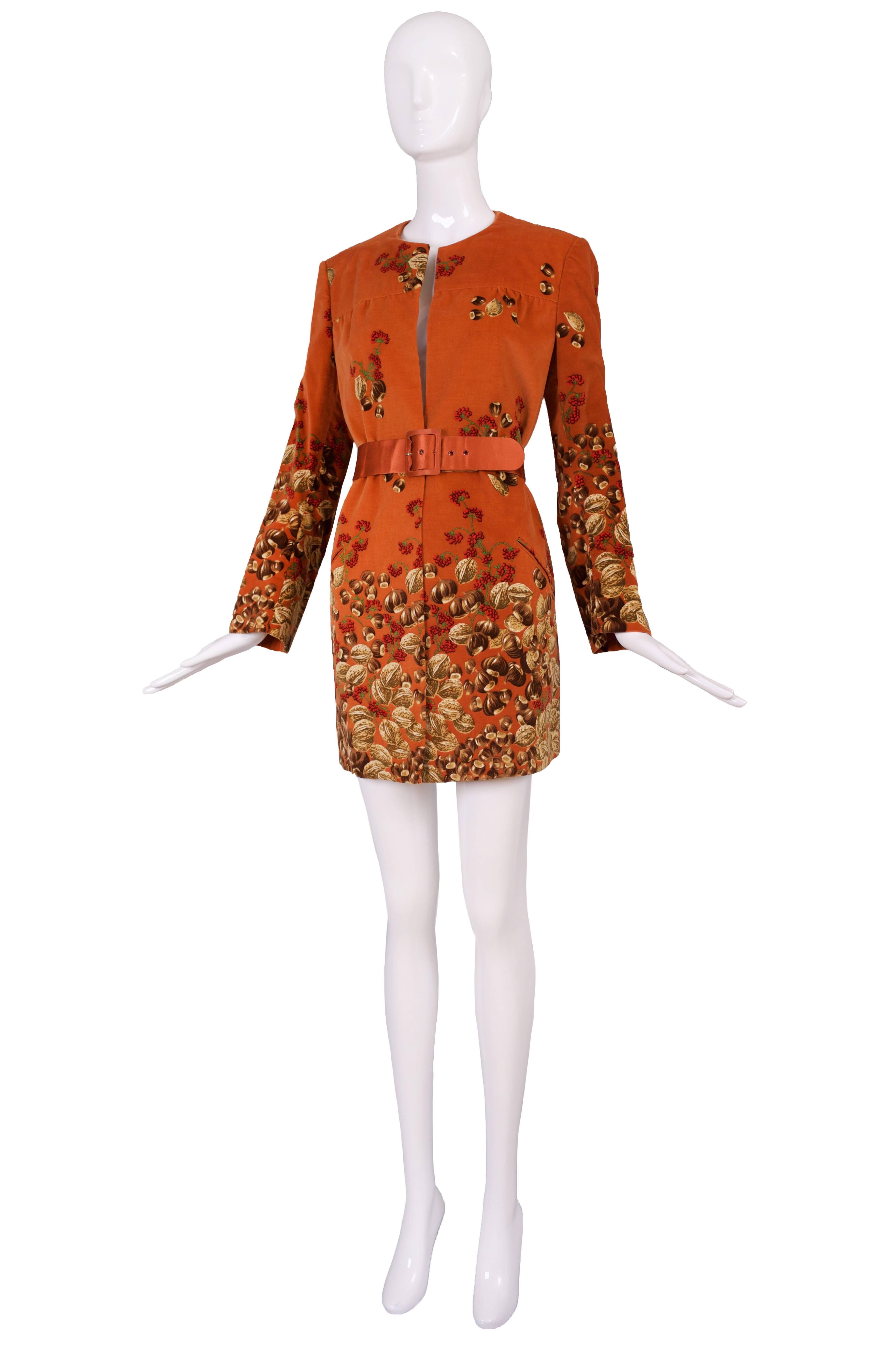 1970's Valentino burnt orange chestnut and walnut print velvet jacket with matching satin belt and frontal pockets. Jacket is in excellent condition but belt is in fair to good condition - could stand to be repaired. Italian size tag 12 but will