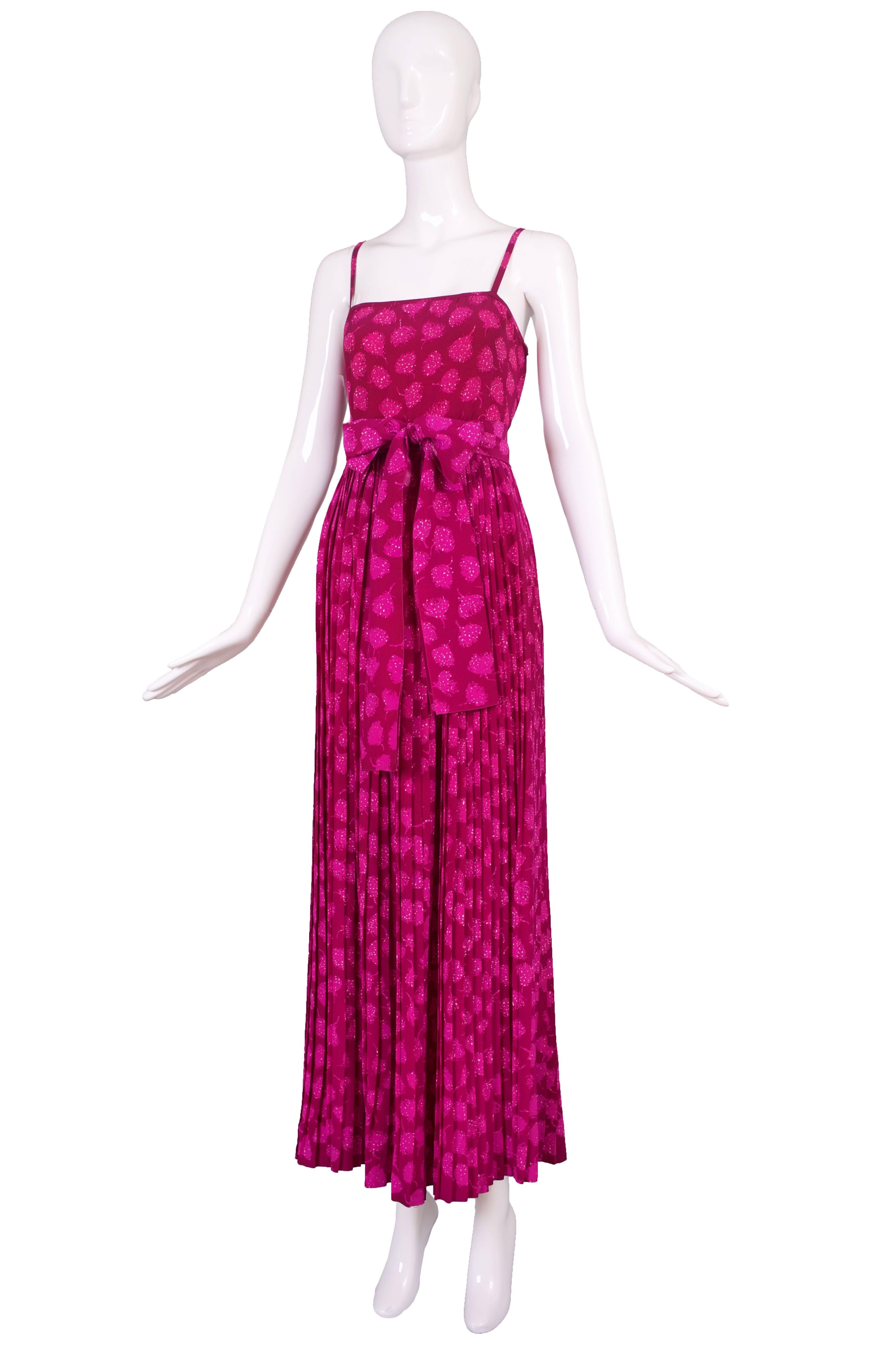 1970's Christian Dior Boutique Couture fuchsia tank and pleated skirt ensemble with self waist tie and matching blouse. In excellent condition - no size tag please consult measurements.
MEASUREMENTS:
Tank Top
Bust - approx. 36