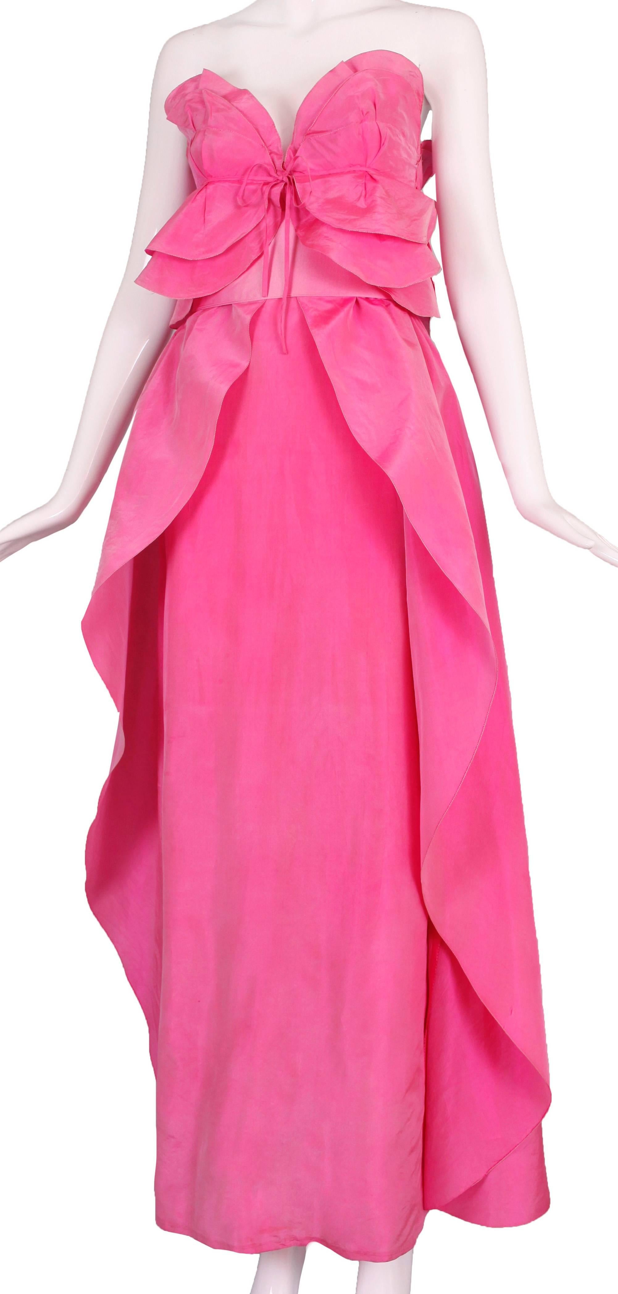 A Loris Azzaro pink silk taffeta strapless gown with boned bodice and multiple tiers embellishing the neckline and two-tiered skirt. In good vintage condition - sold as is, which is reflected in the price. Please ask any and all questions related to