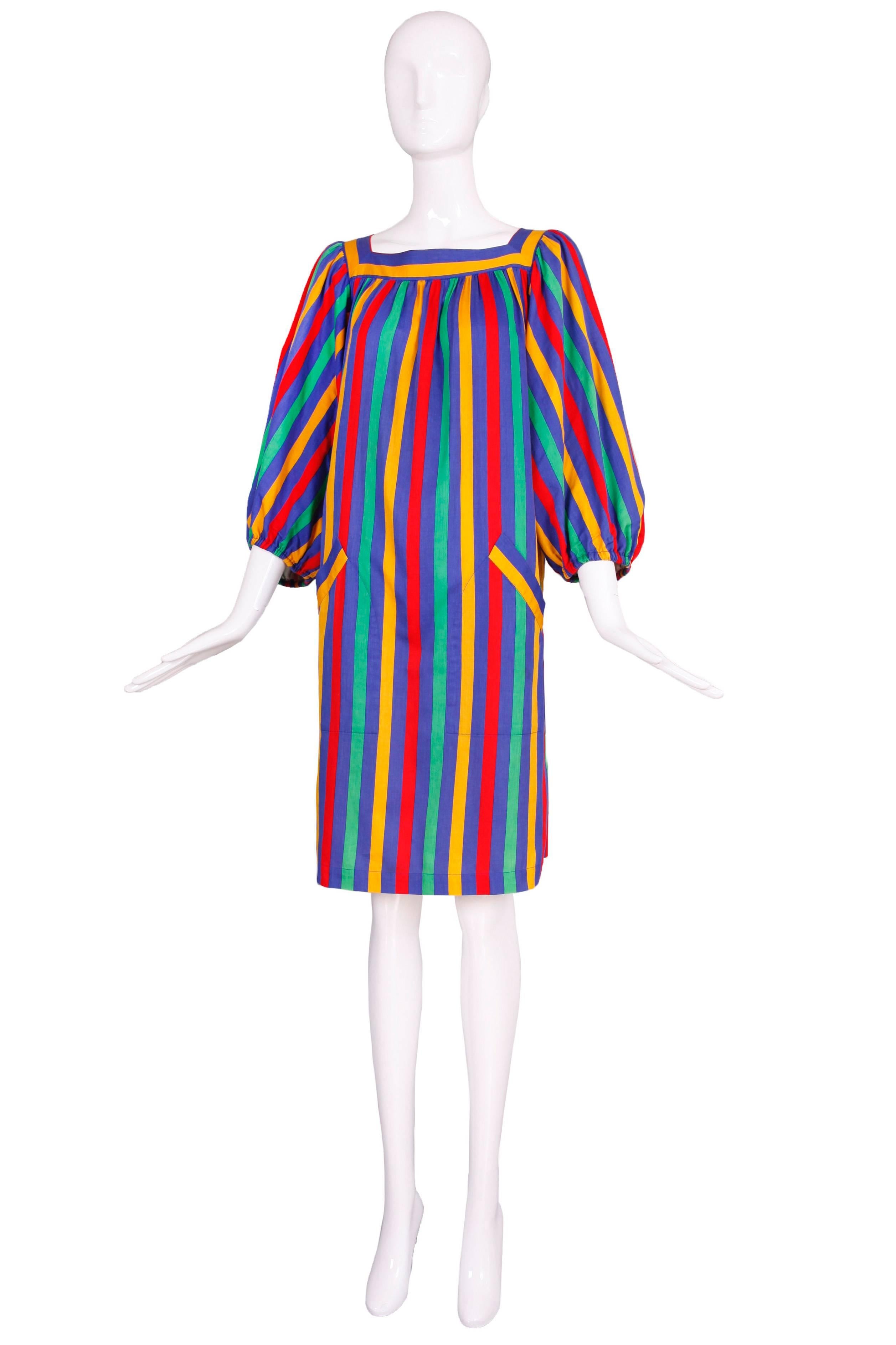 Vintage Yves Saint Laurent polished cotton striped smock dress with a bateau style neckline, full 3/4 balloon sleeves, slits up either side and frontal pockets. In excellent condition. Please consult measurements.
MEASUREMENTS:
Bust - 38"
Waist
